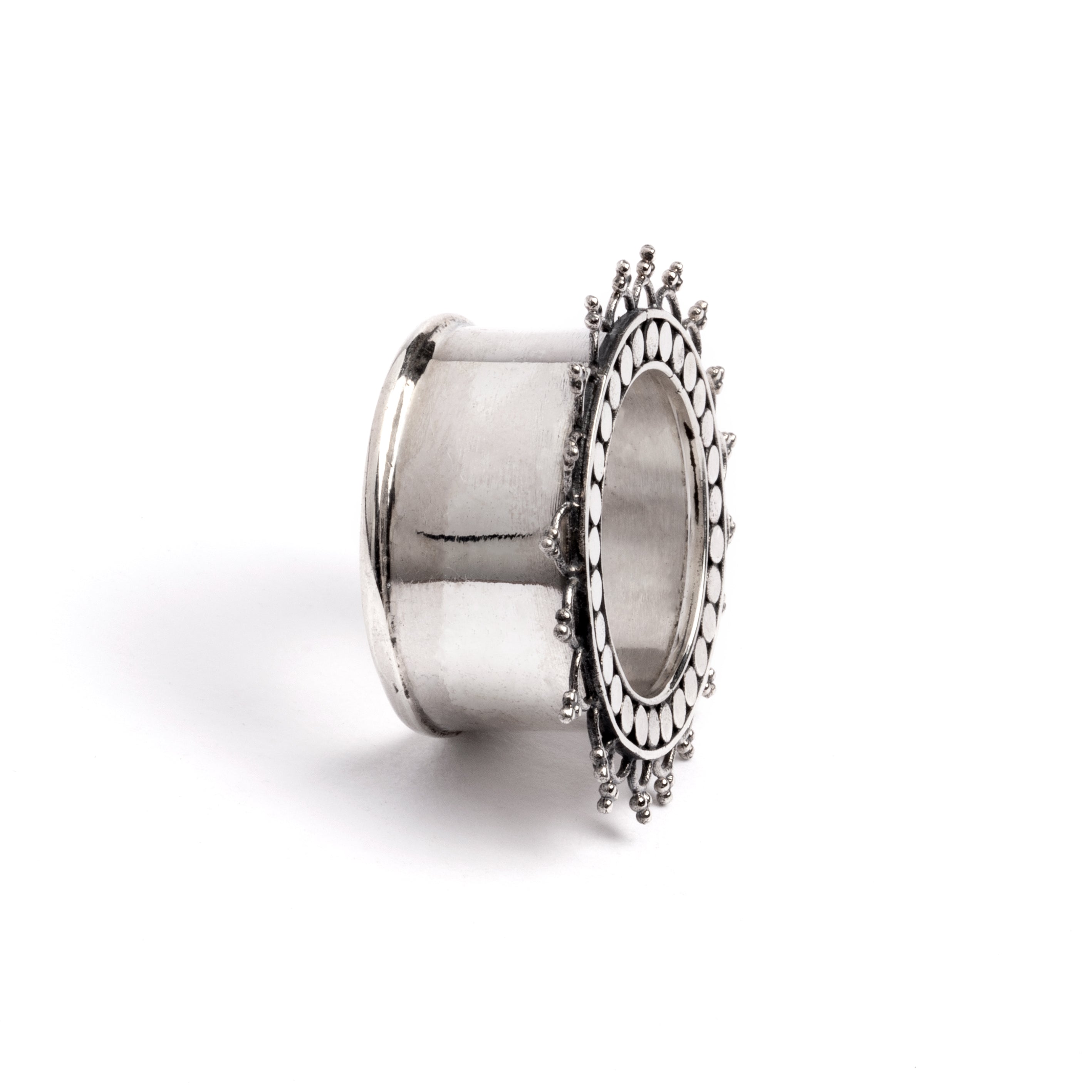 silver tribal flower ear tunnel side view