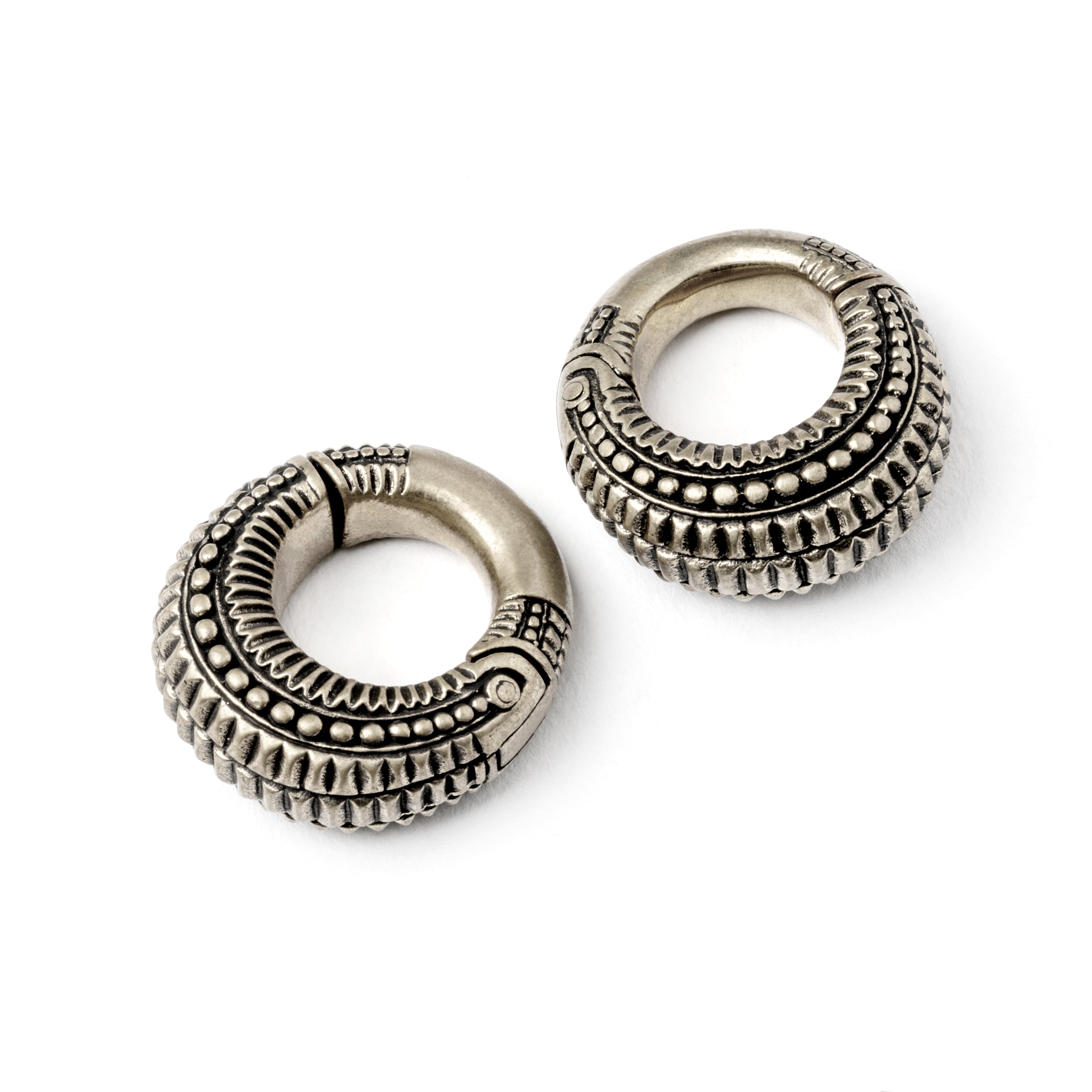 pair of 2g silver brass tribal ear weights hoops side and frontal view