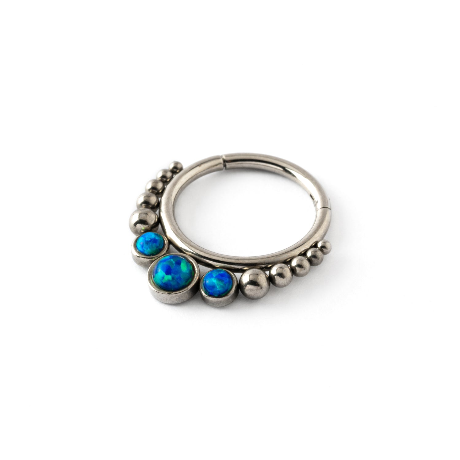 Siti septum clicker ring trio blue Opals right side view