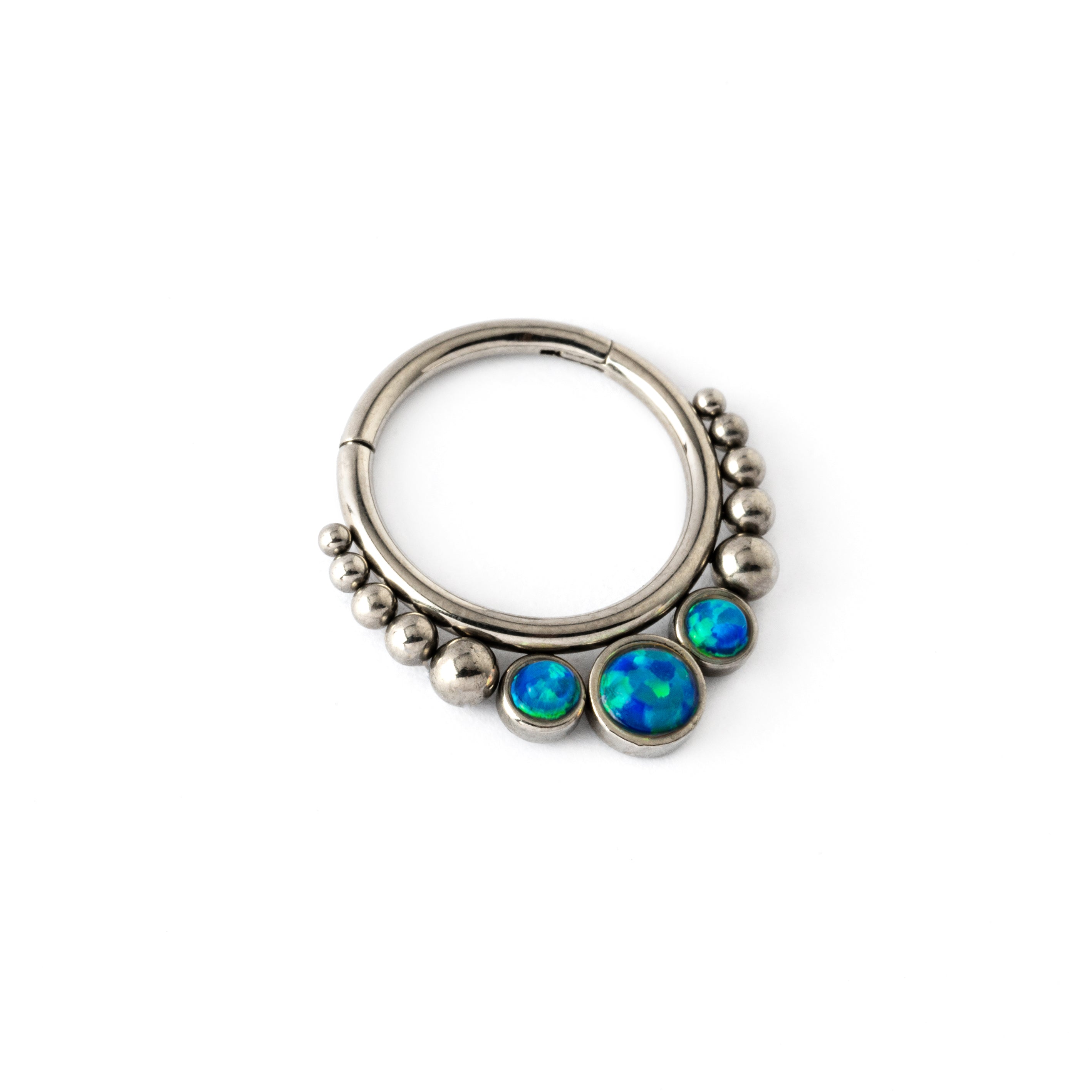 Siti septum clicker ring trio blue Opals left side view