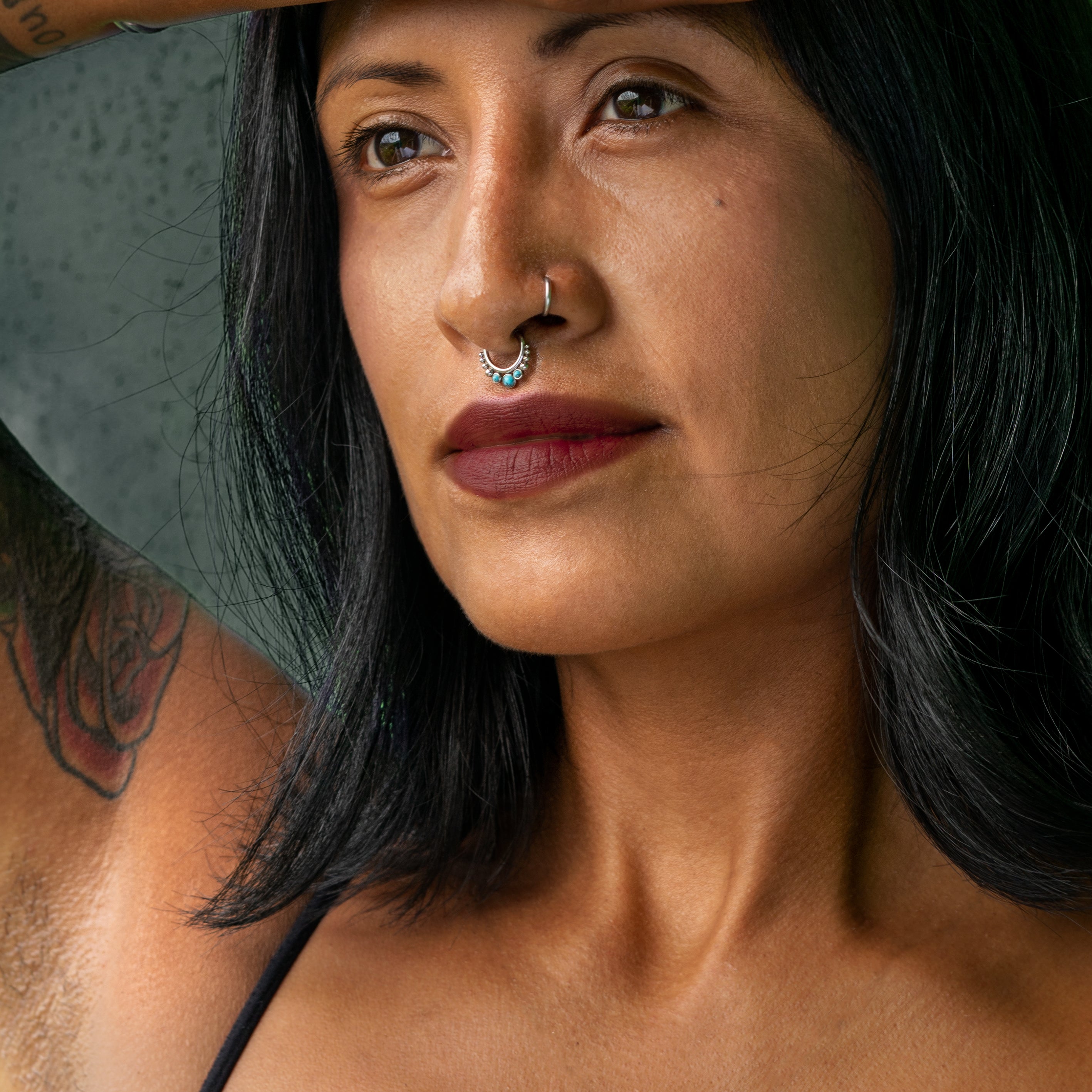 model wearing Siti Turquoise Septum Clicker