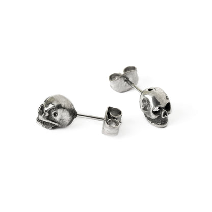 Skull stud earrings left and back side view