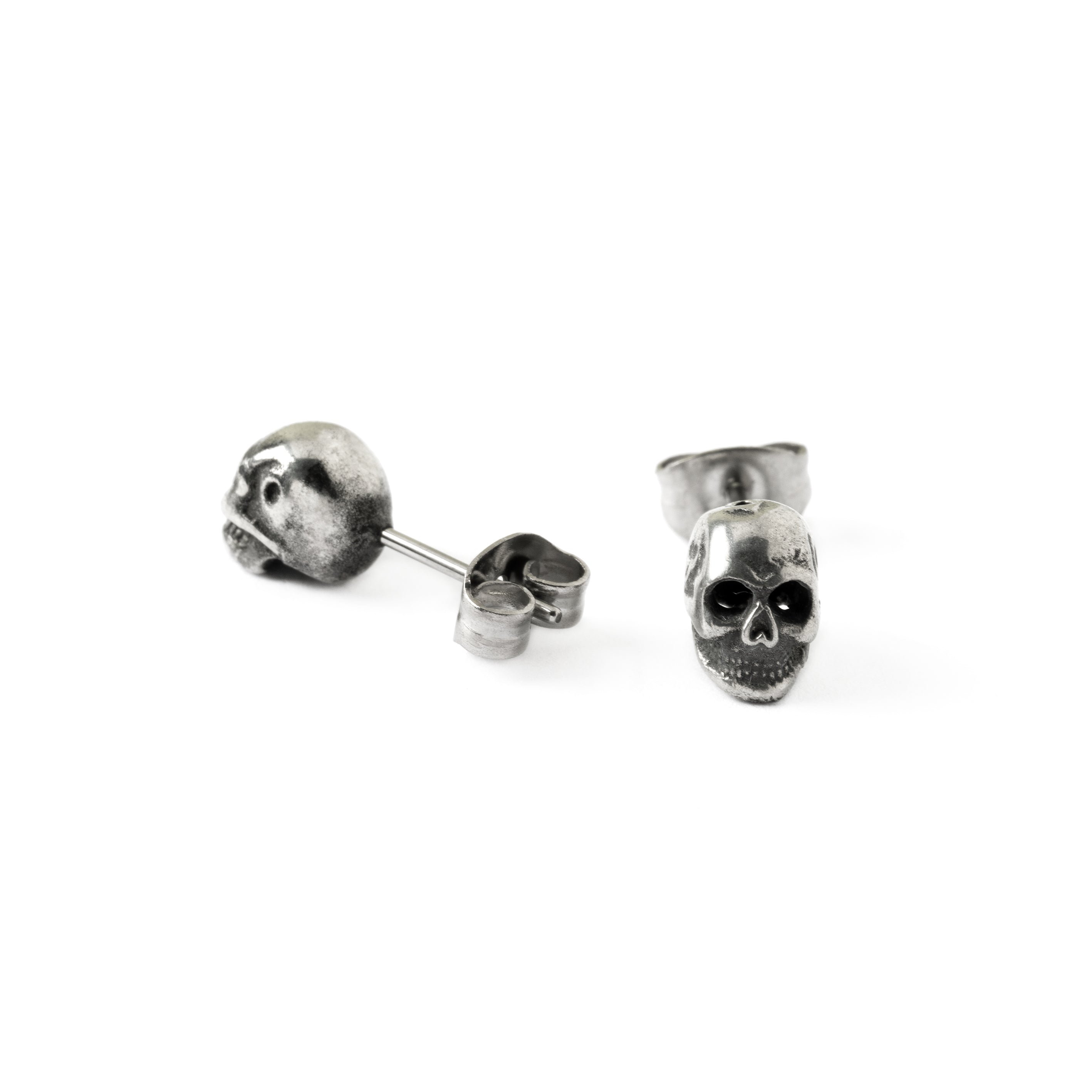 Skull stud earrings front and back side view