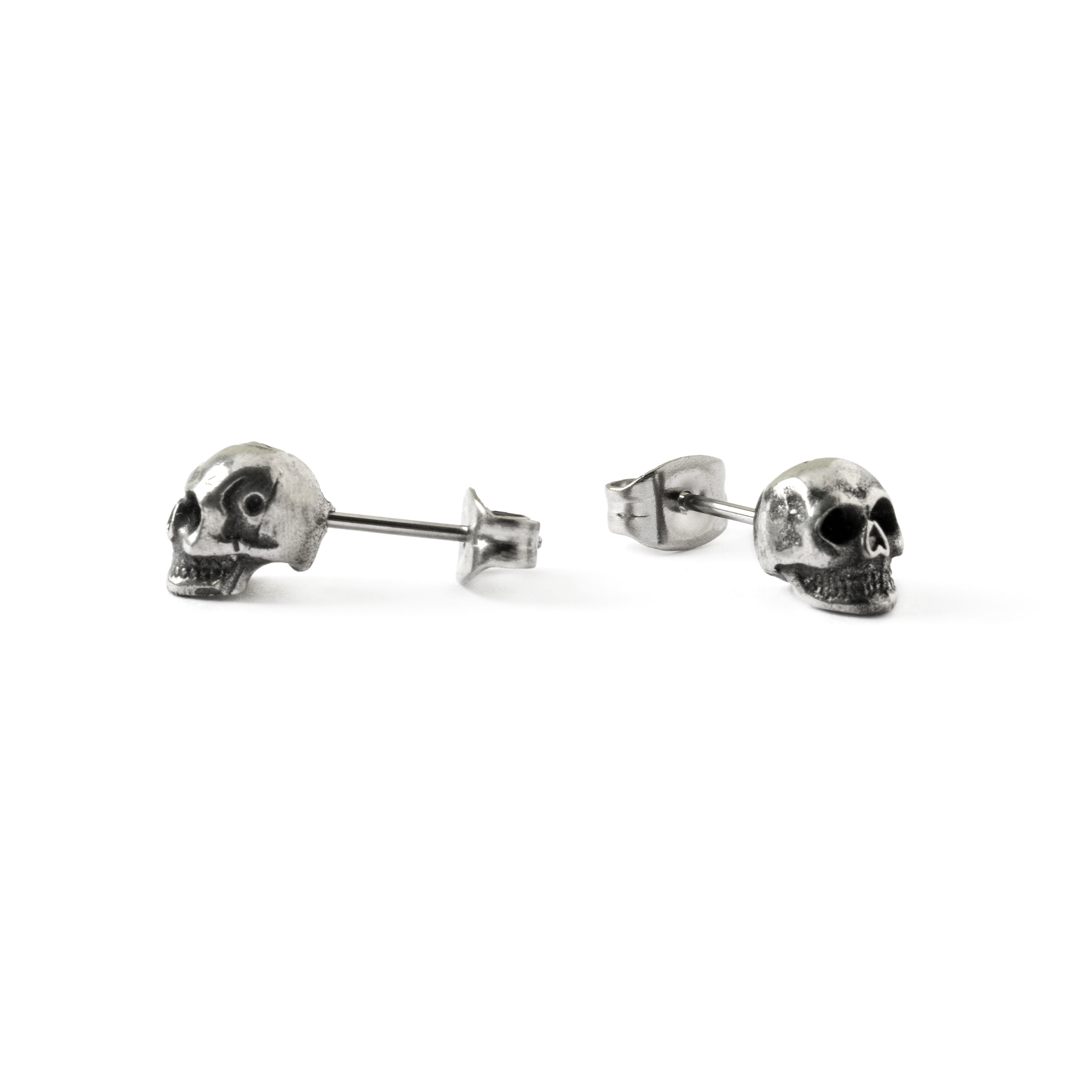 Skull stud earrings left and right side view