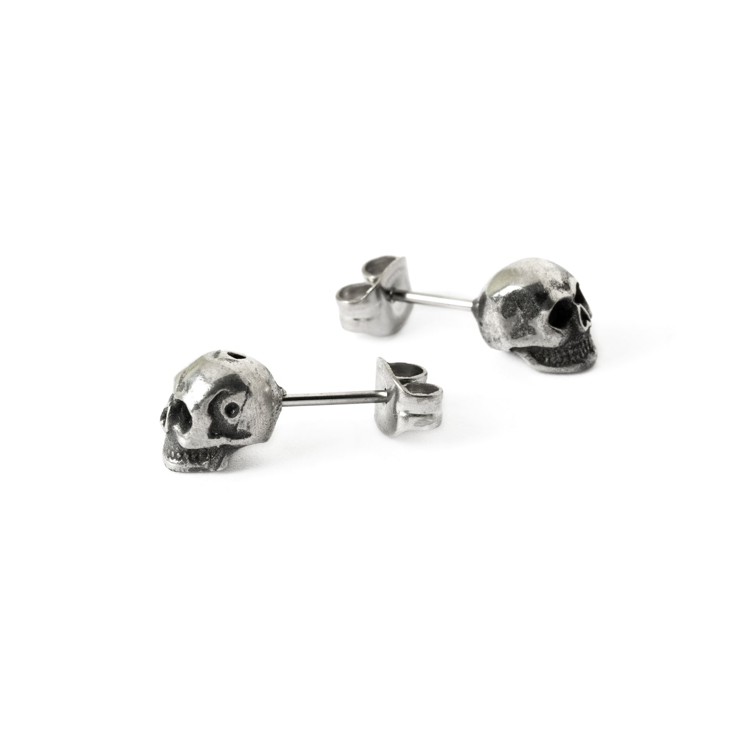 Skull stud earrings left and right side view