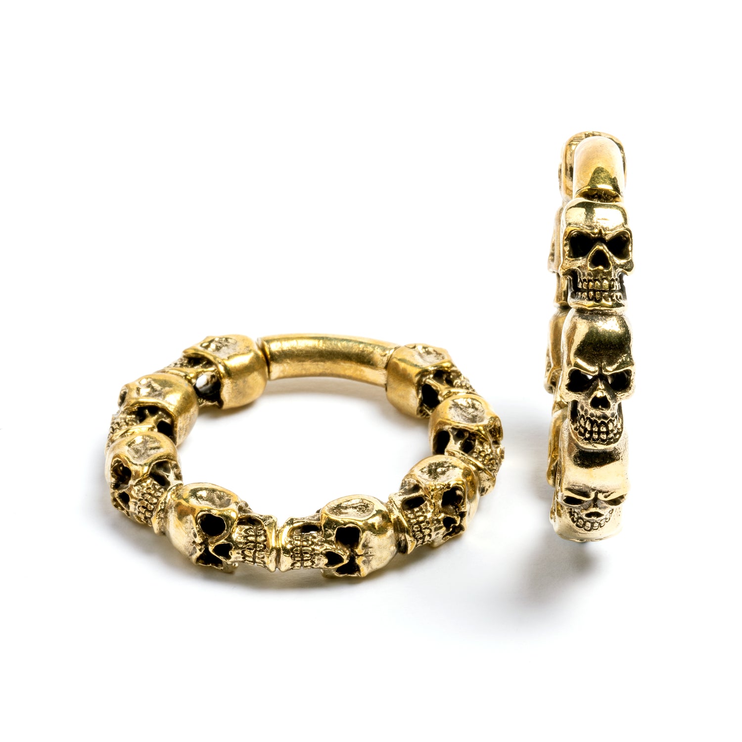 pair of gold brass skulls band hoop gauges left side and front view