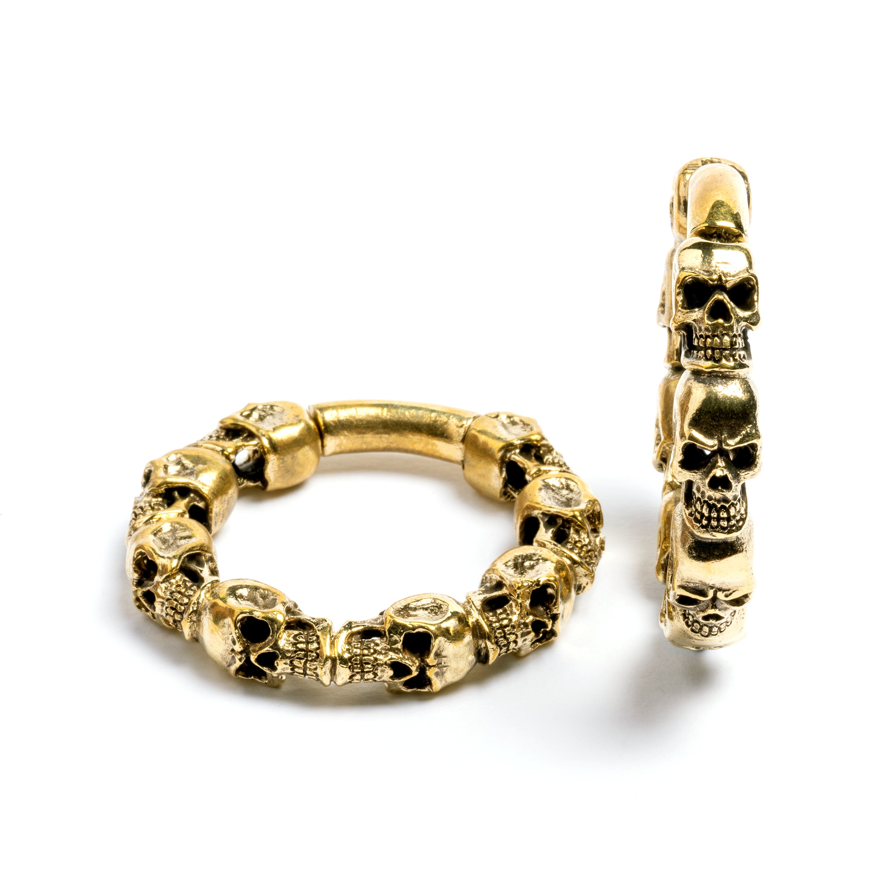 pair of gold brass skulls band hoop gauges left side and front view