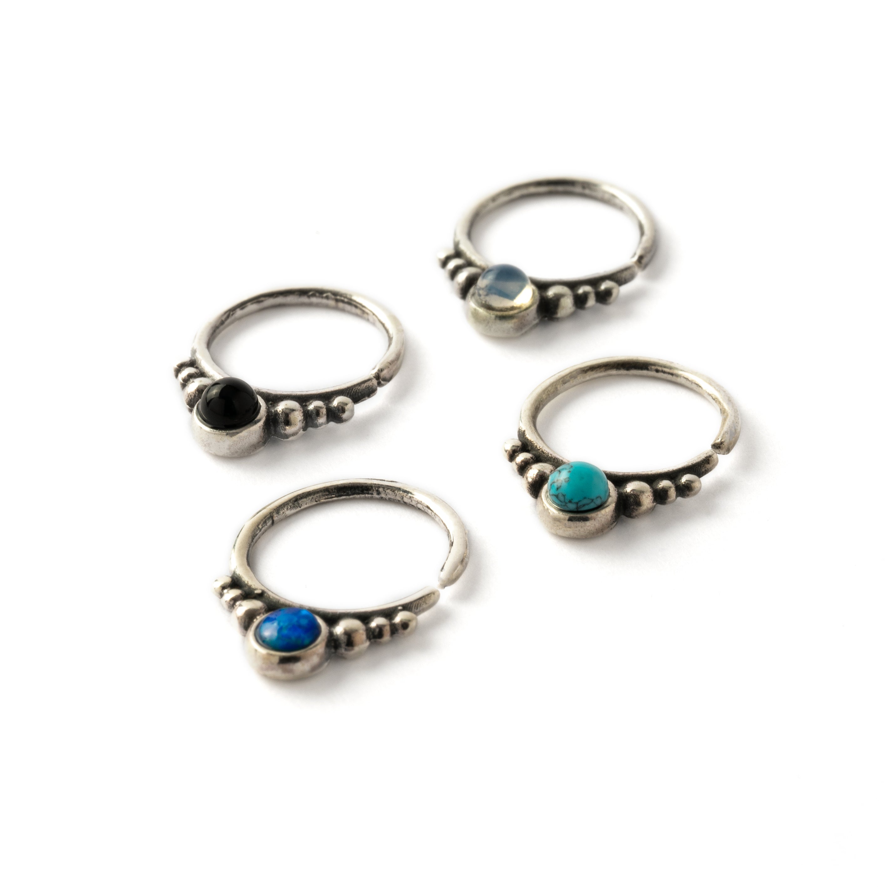 Soma Silver septums with black Onyx, opal, turquoise side view