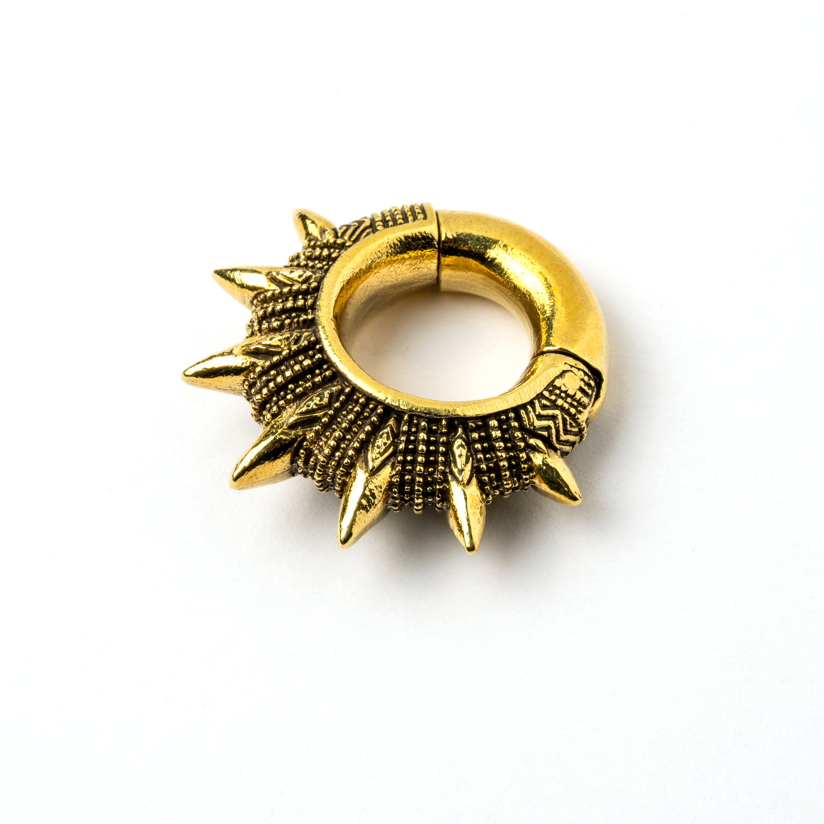 single golden spiky ear weights hoops left side view