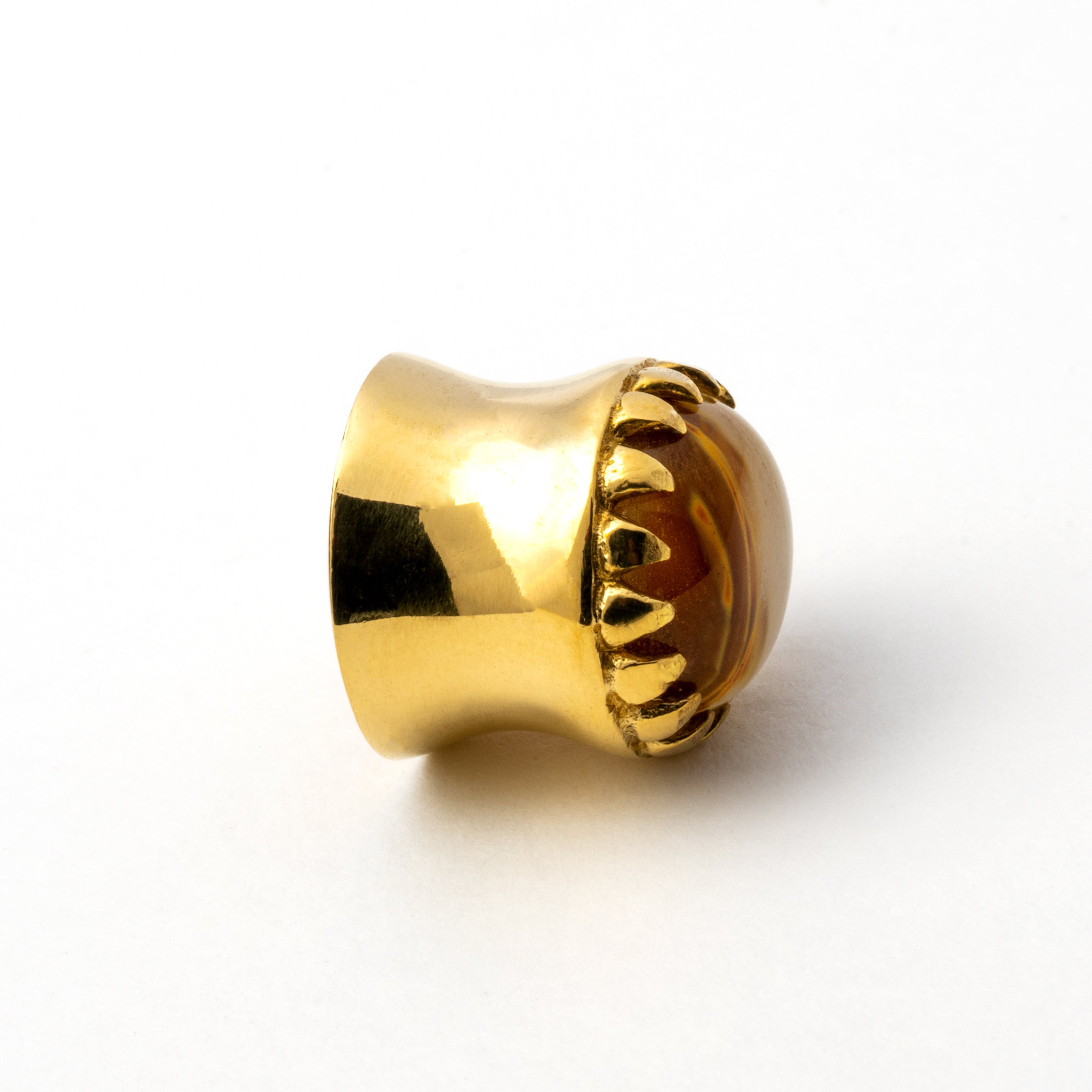golden plug earring crown shaped with tiger eye glass side view