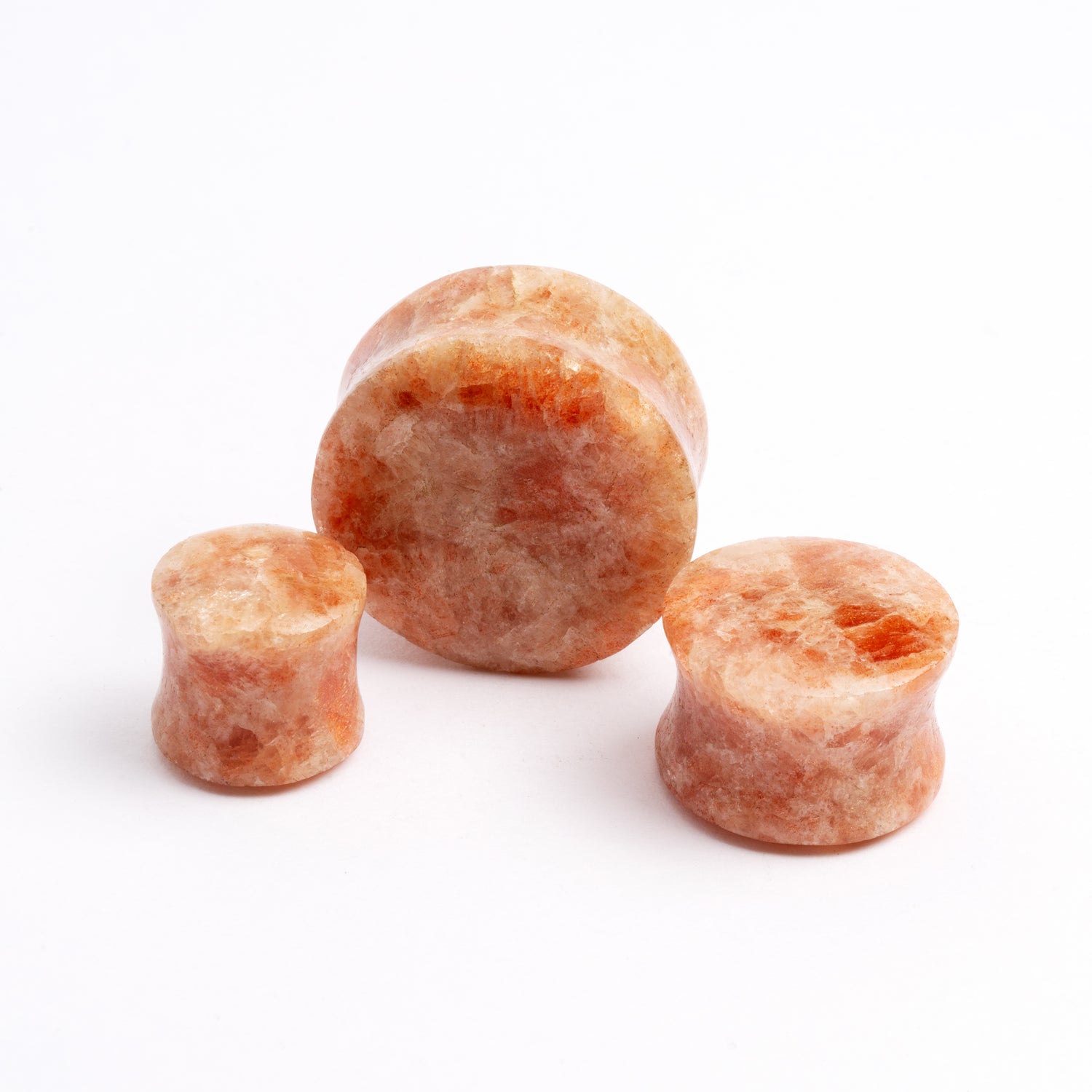 Sunstone-Plug-Earrings_4several sizes of Sunstone double flare ear plugs front and side