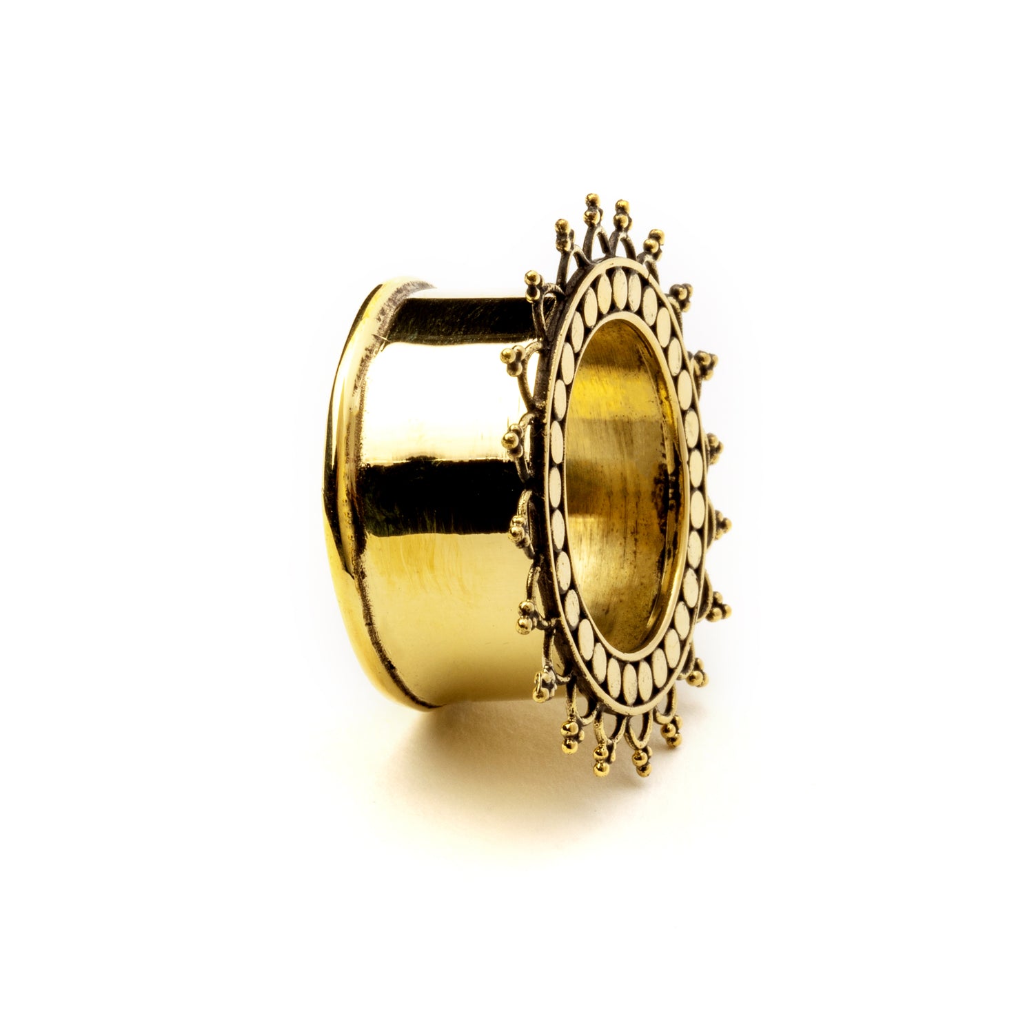 golden brass tribal flower ear tunnel side view