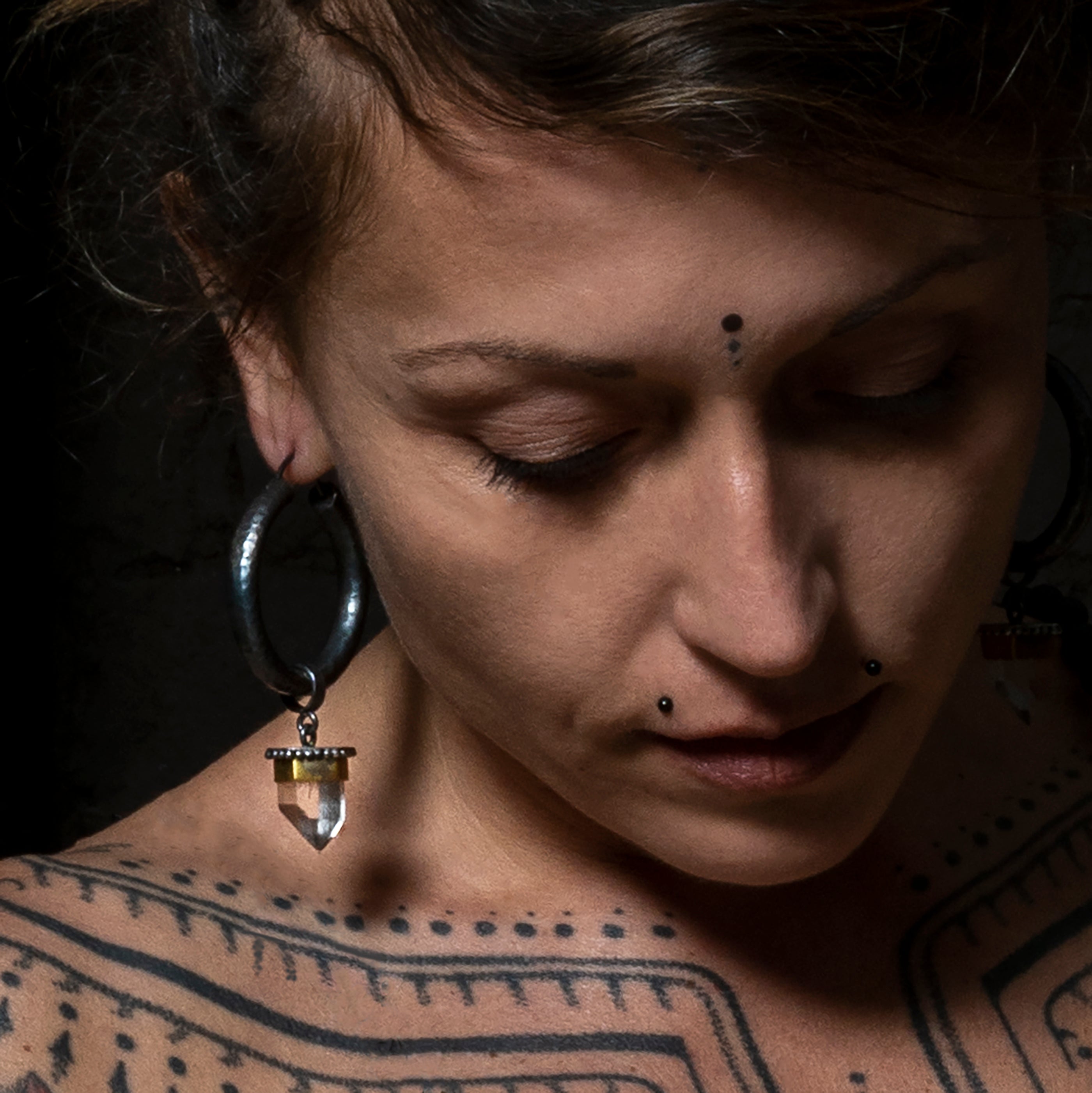 model wearring Shachi Hoops with Crystal Quartz