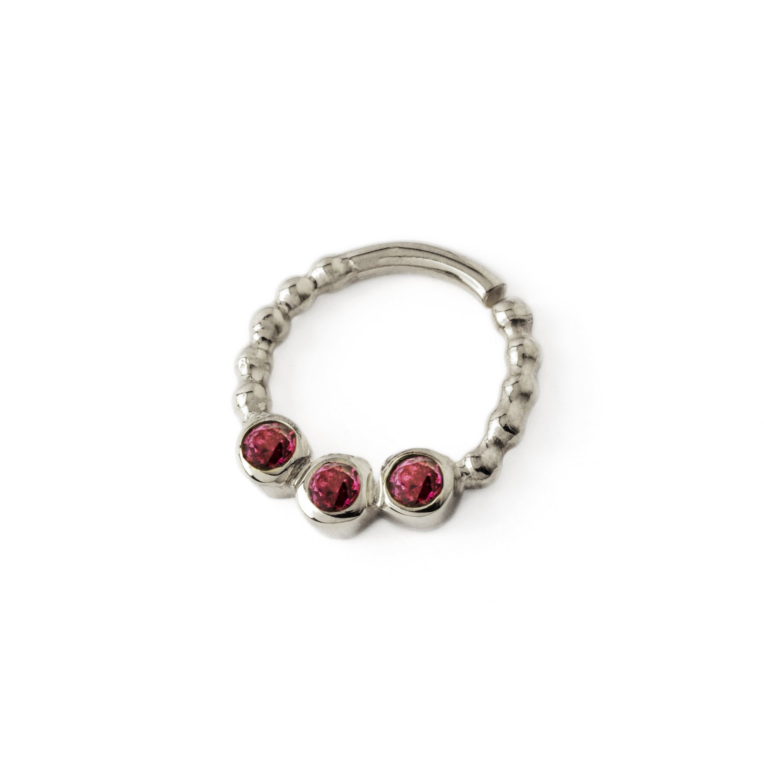 sterling silver dotted septum ring with three Garnet gemstones left side view