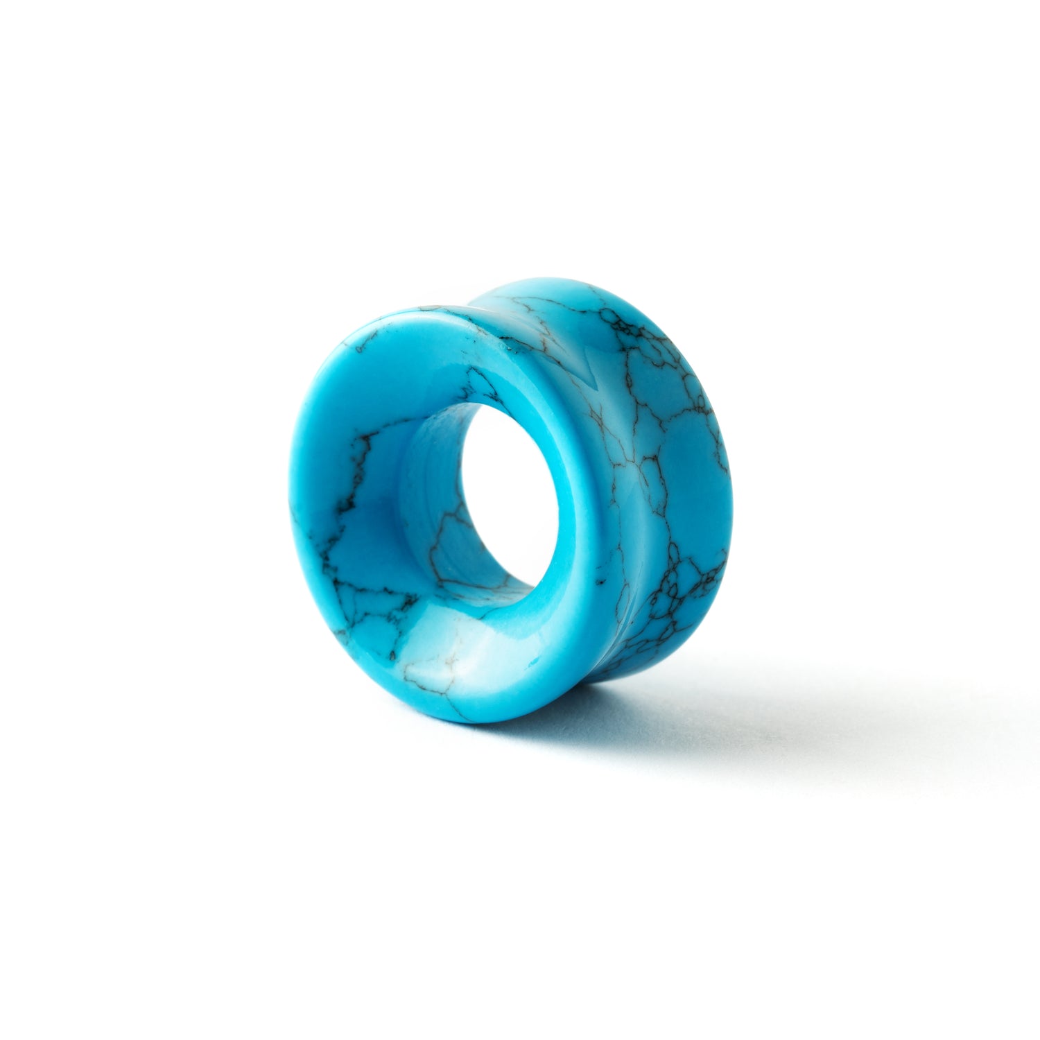 single turquoise double flare stone ear tunnel back view