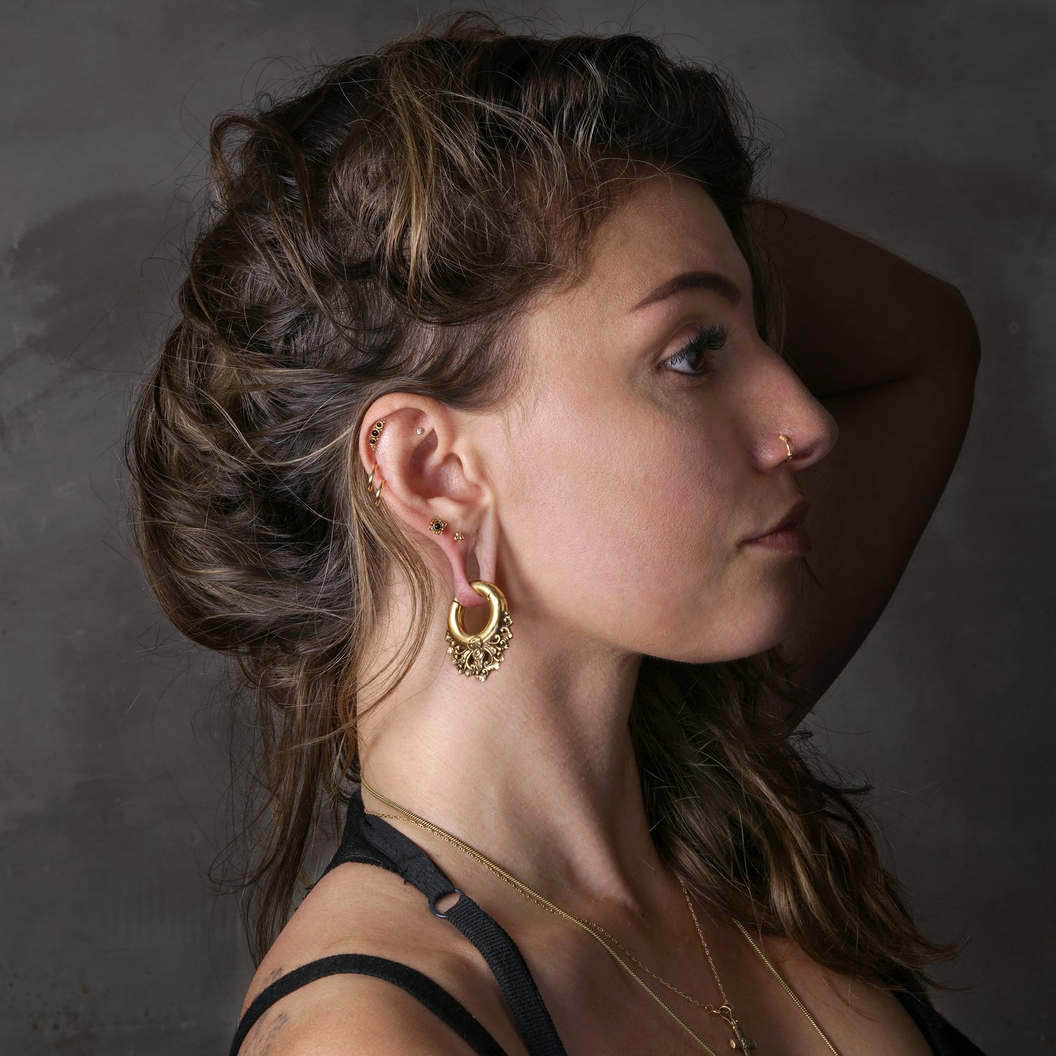 model wearing Golden Victoria Hoop Hangers