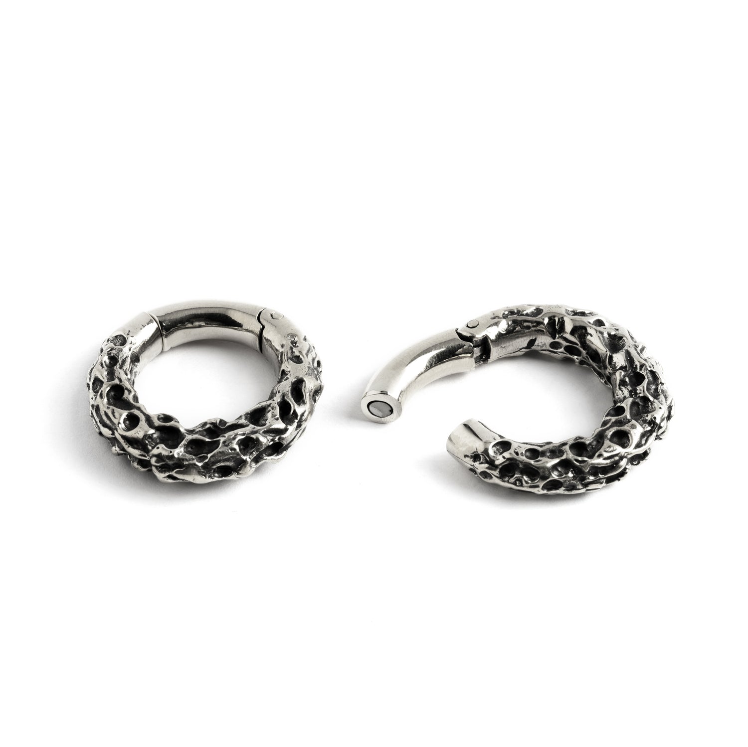 Pair of silver brass hoop hangers with rocky texture locking system view