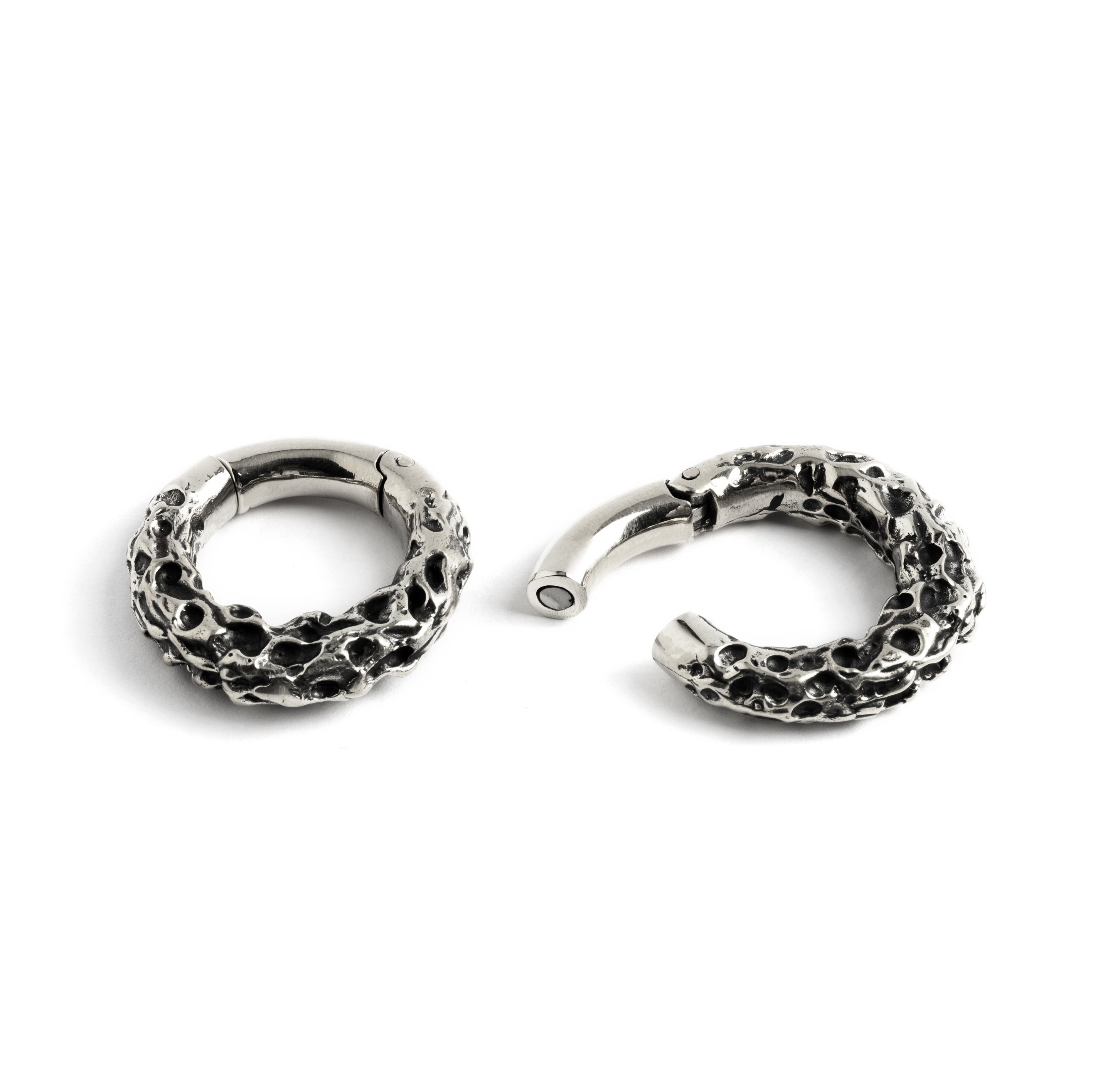 Pair of silver brass hoop hangers with rocky texture locking system view