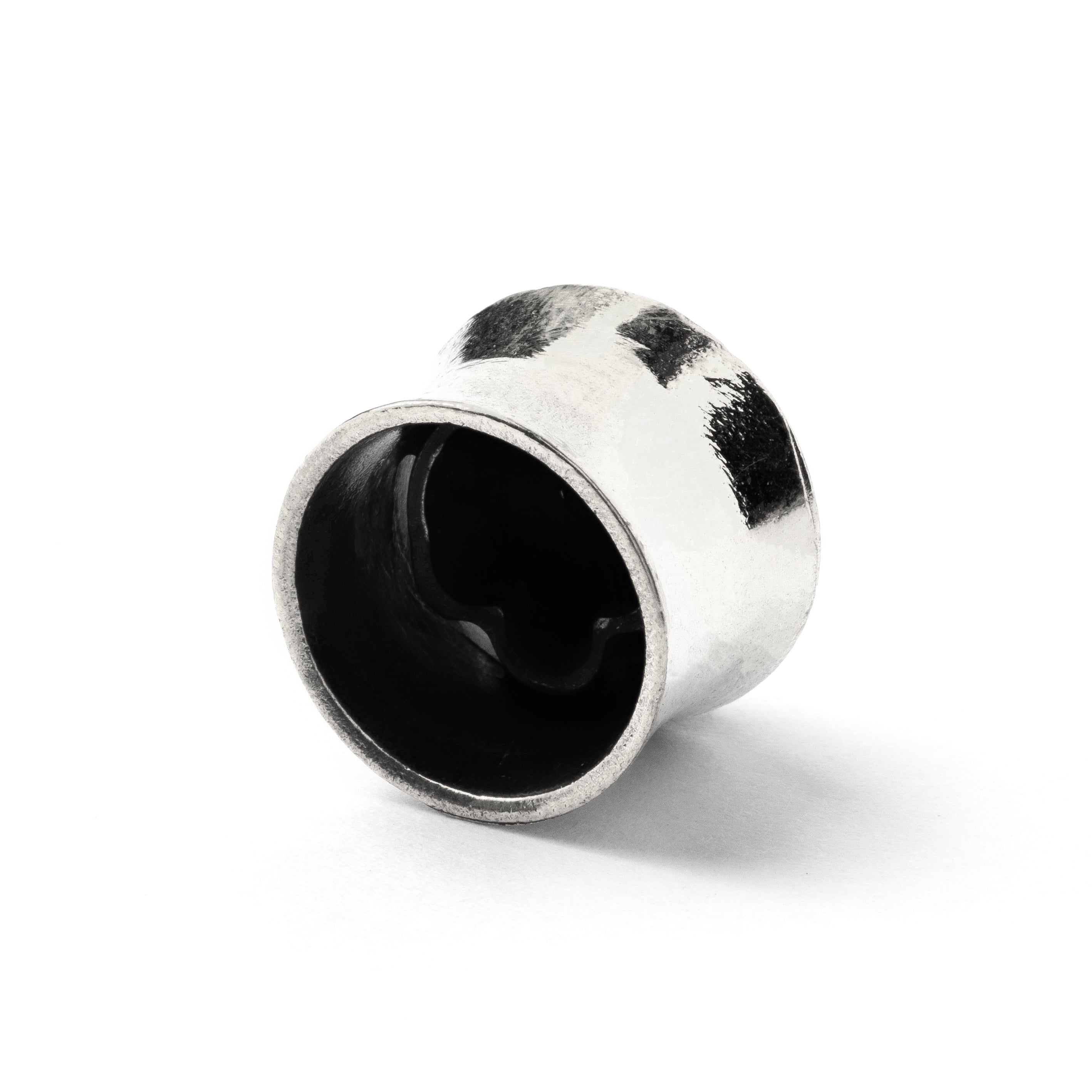 White brass skull ear plug back side view