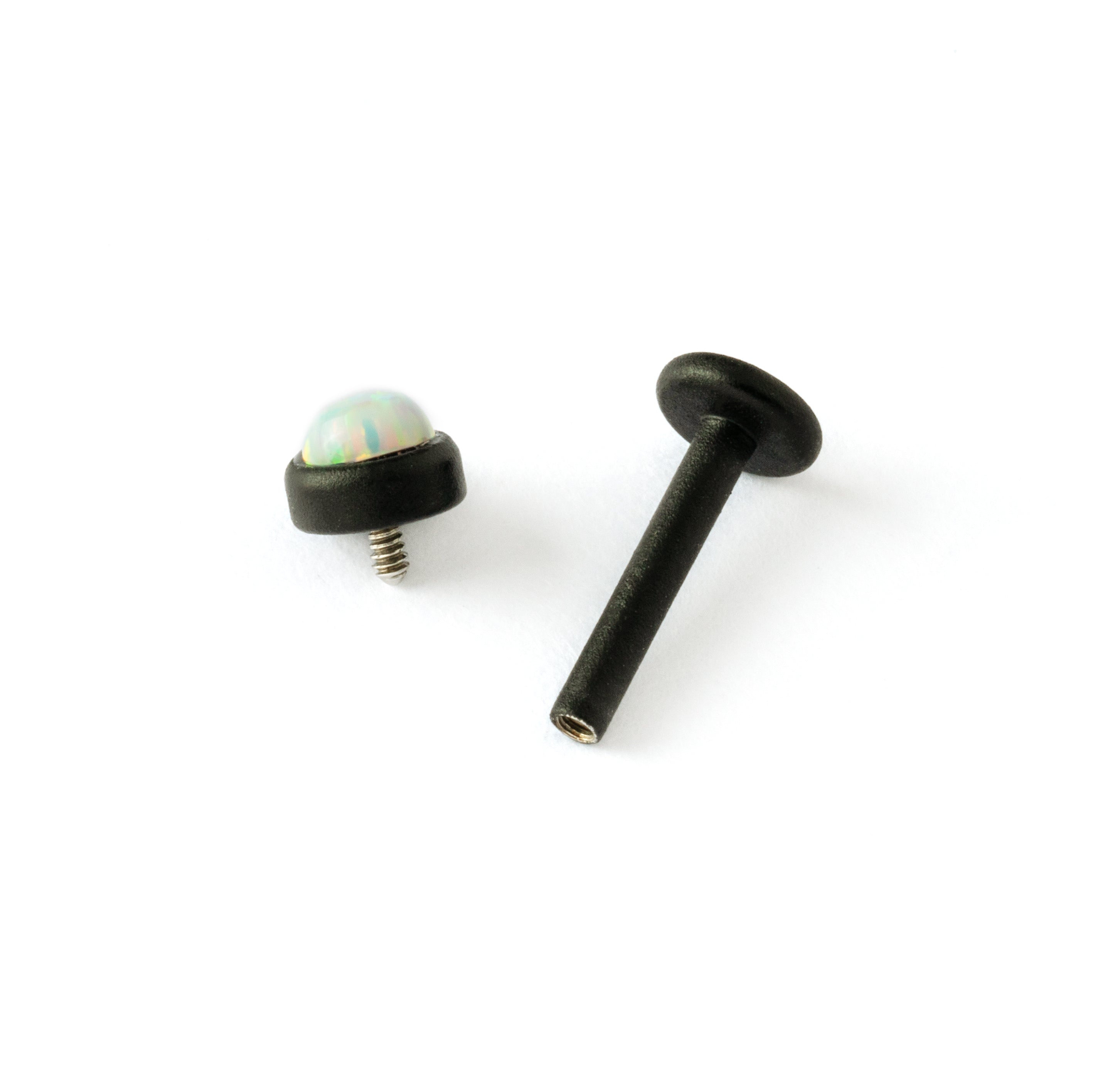 matte black surgical steel with white opal labret stud left internally threaded closure view