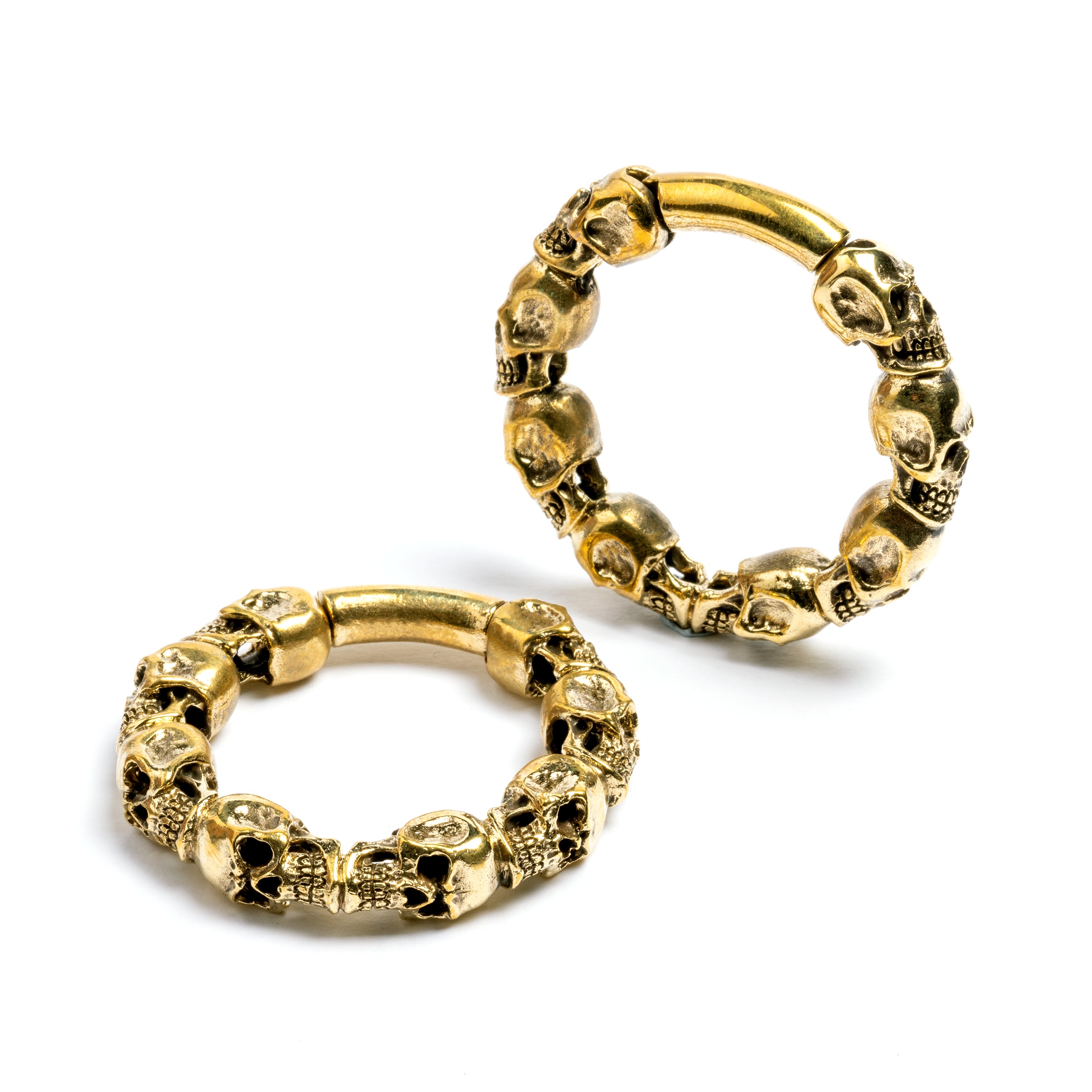pair of gold brass skulls band hoop gauges side and frontal view