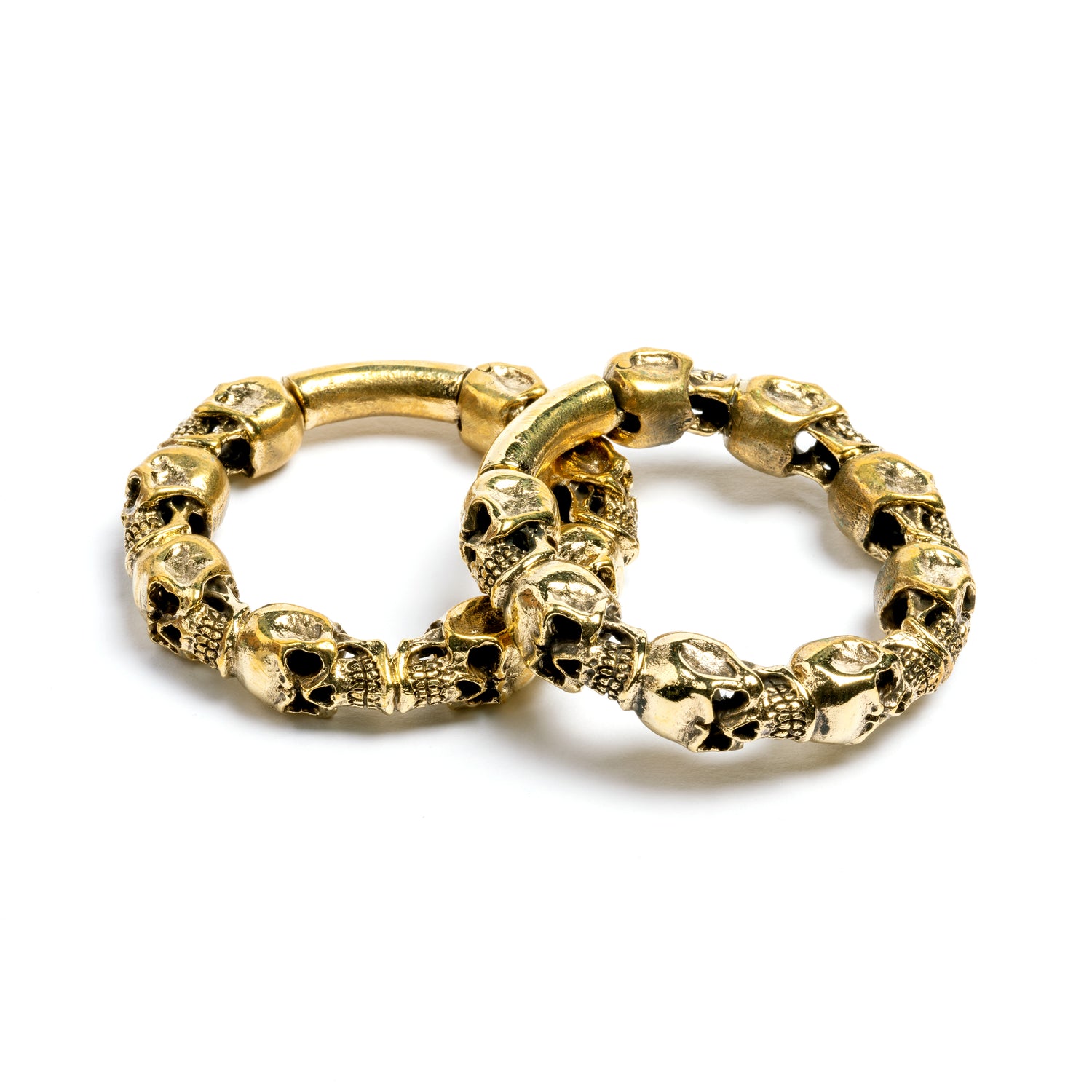 pair of gold brass skulls band hoop gauges side and front view