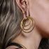 model wearing Golden Stacking Hoop Hangers