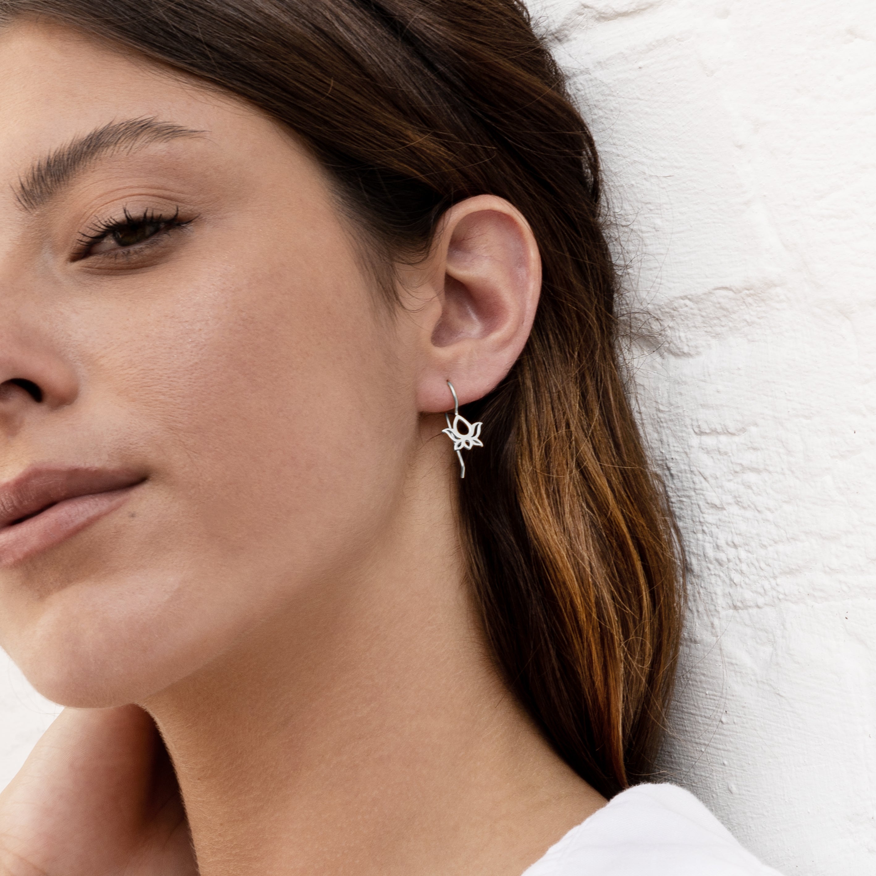 model wearing Silver Lotus Earrings