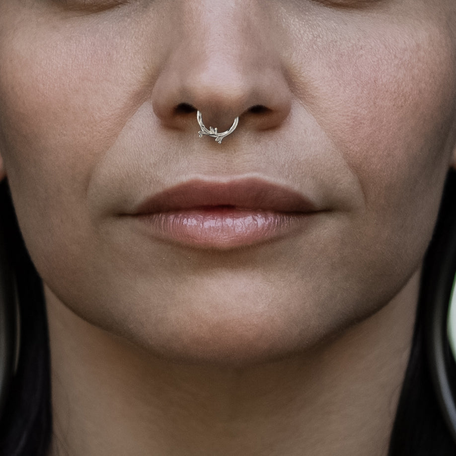 model wearing 14k White Gold Twig Septum Clicker