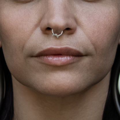 model wearing 14k White Gold Twig Septum Clicker