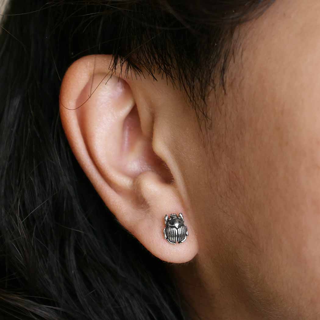 model wearing Scarab Stud Earrings
