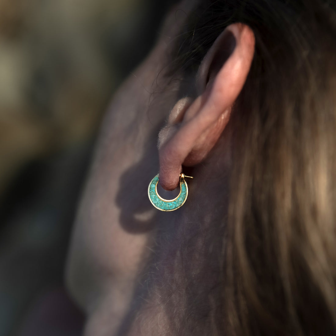 model wearing Golden Aanya Turquoise hoop huggies Earrings