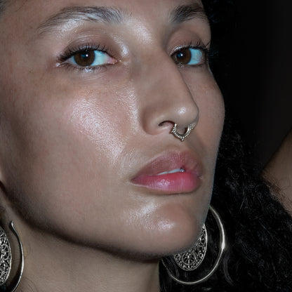 model wearing Deva Septum Clicker Ring