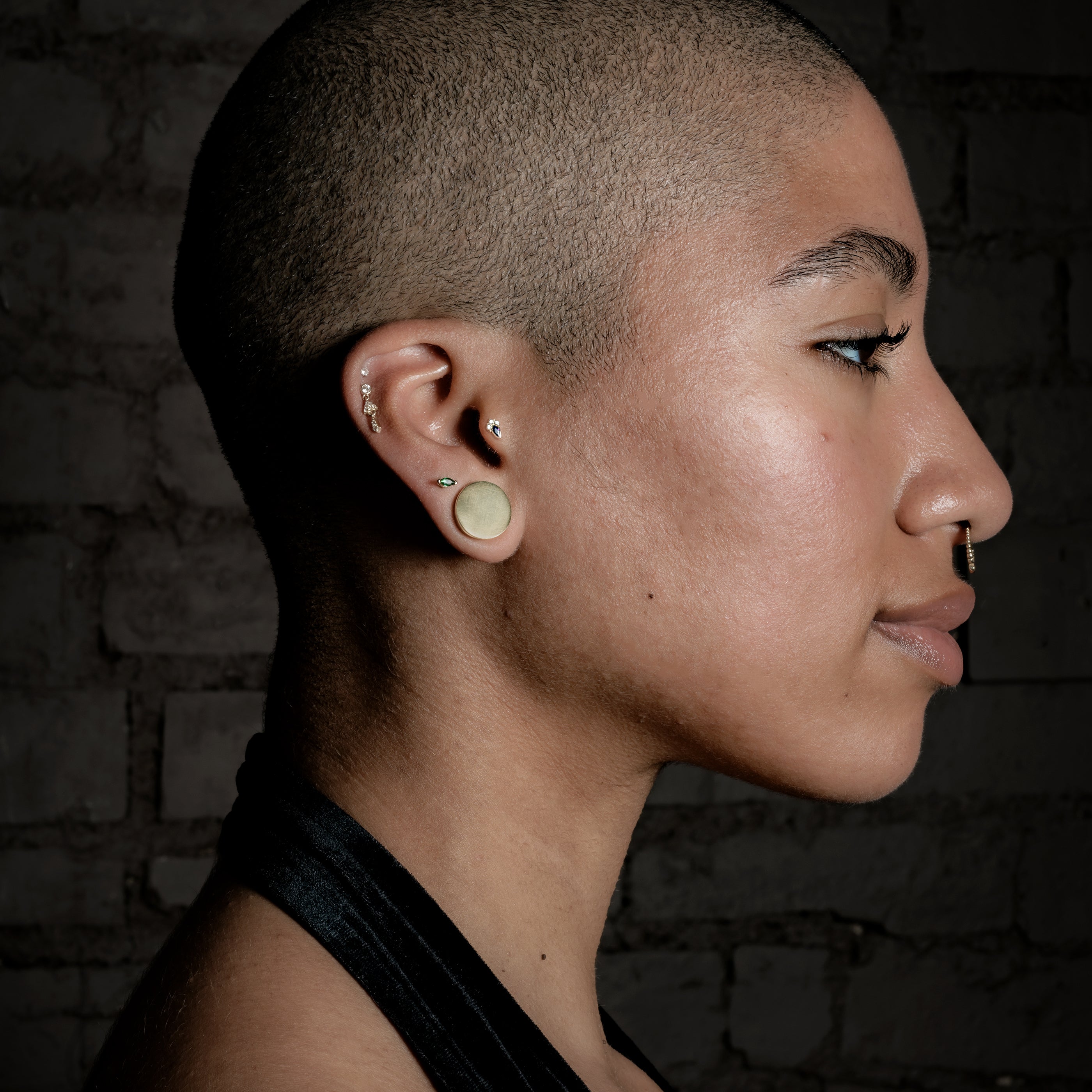 Model wearing Plain Brass Plug