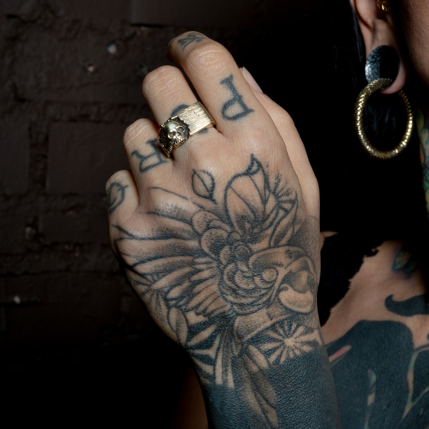 model wearing Break Free Skull ring
