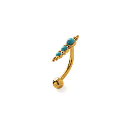 Floating Golden Navel Piercing with Turquoise left side view