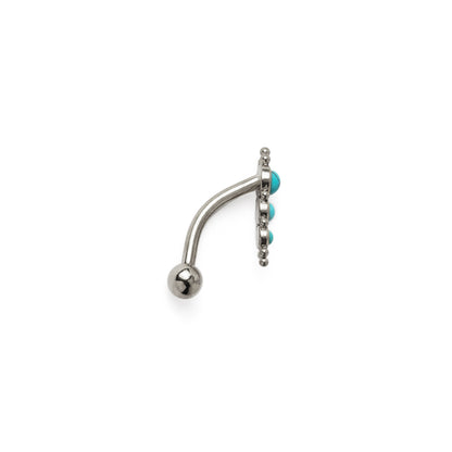 Floating Navel Piercing with Turquoise side view