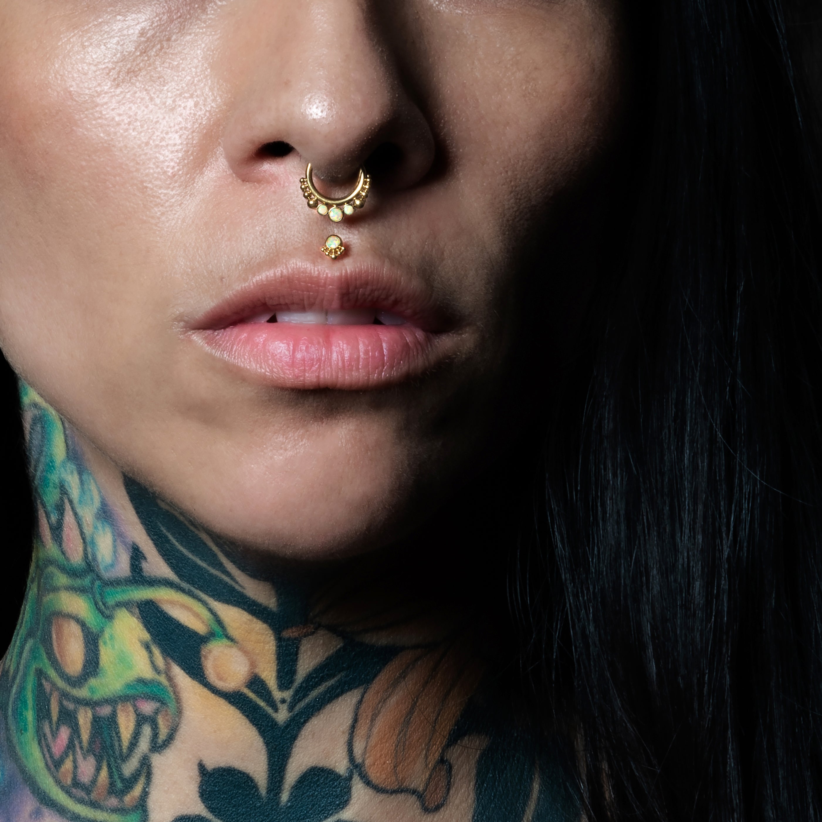 model wearing Layla Golden Labret with Opal and siti septum clicker