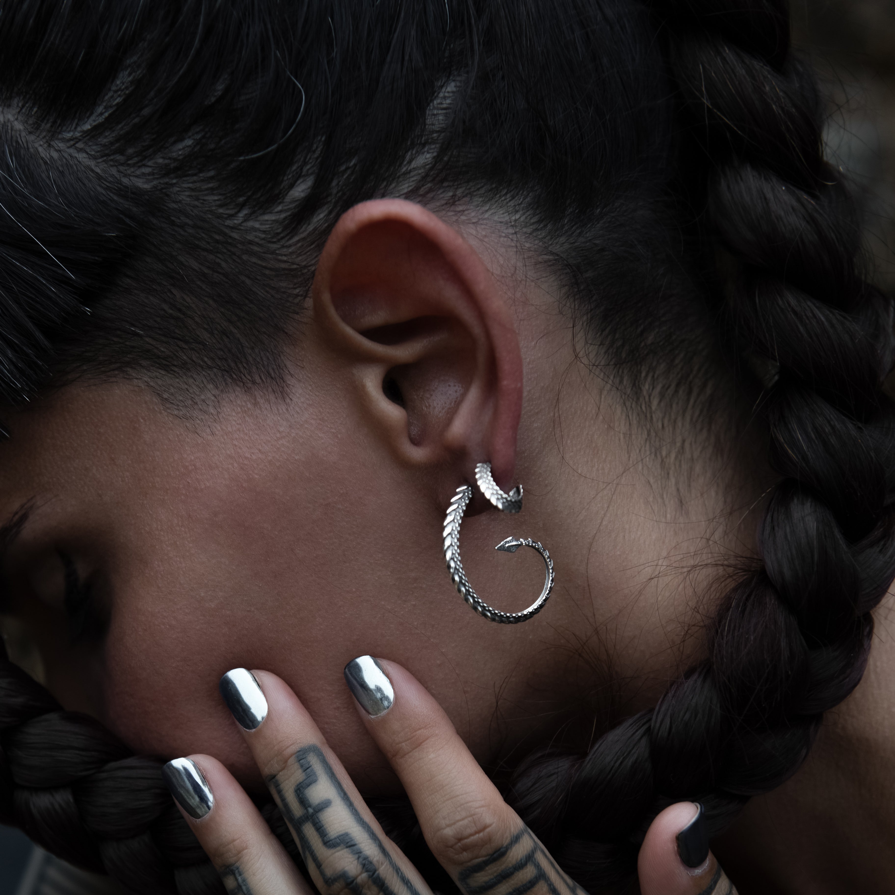 model wearing Silver Dragon Tail Open Hoops