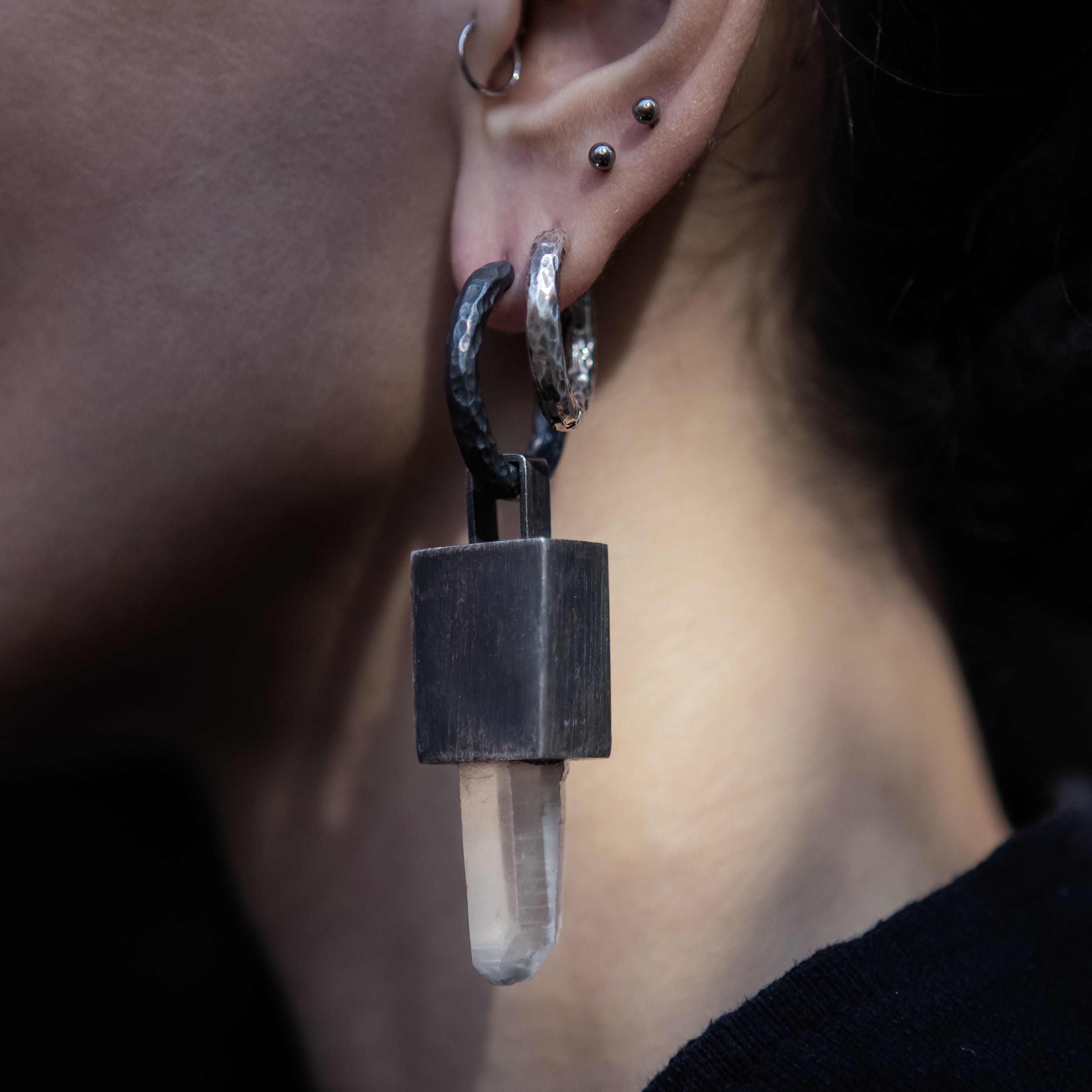model wearing Black Silver Block Crystal Quartz drop Earrings