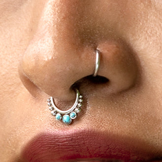 model wearing Siti Turquoise Septum Clicker close up view