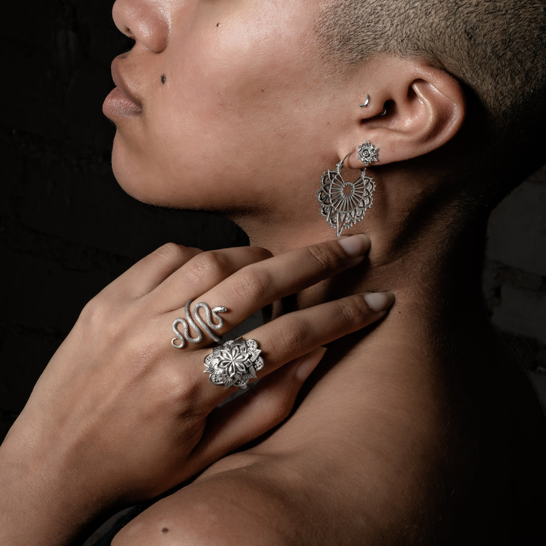 model wearing Vinyasa Mandala Studs, Vinyasa earrings, 14k gold moon labret, snake ring and padma ring