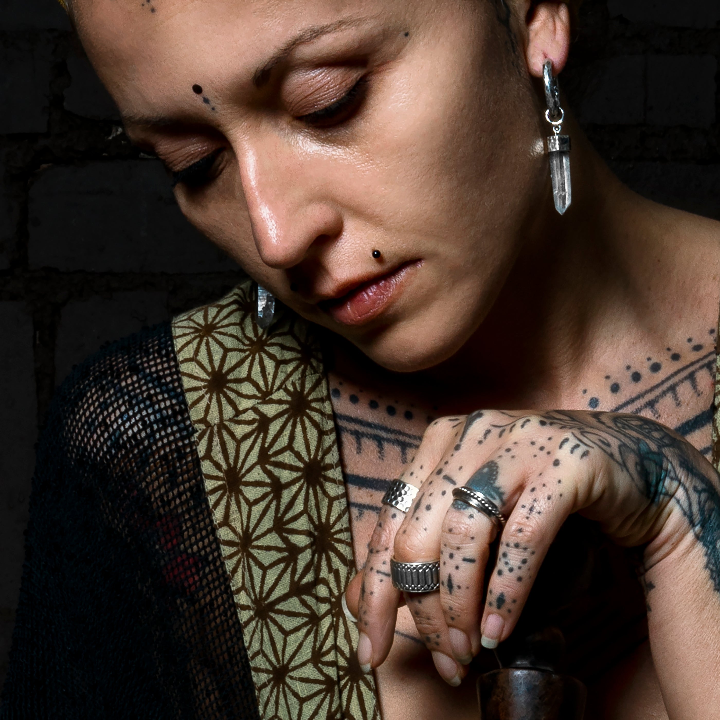 model wearing Black Silver & Crystal Clicker Earrings