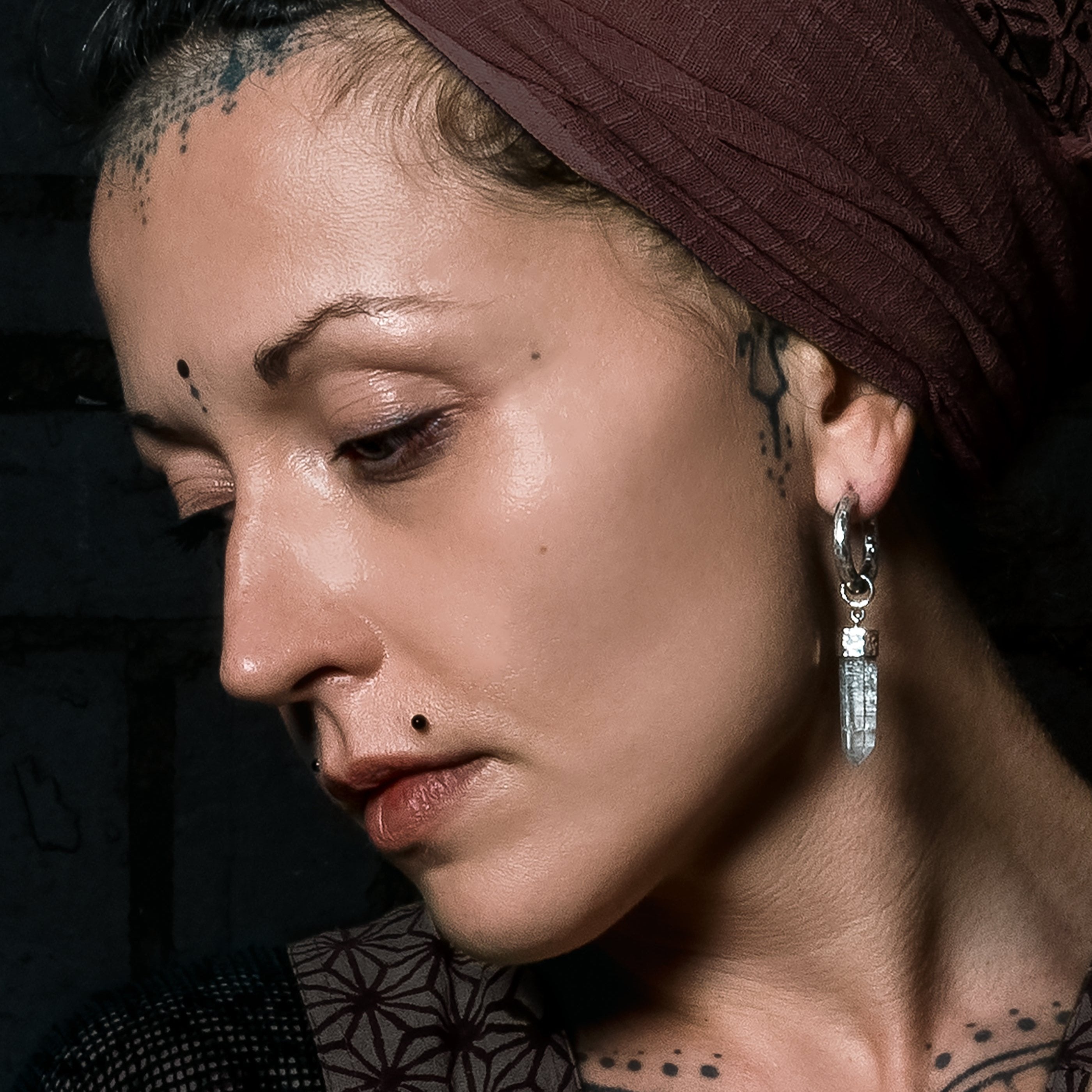 model wearng Silver and Crystal Clicker Earrings