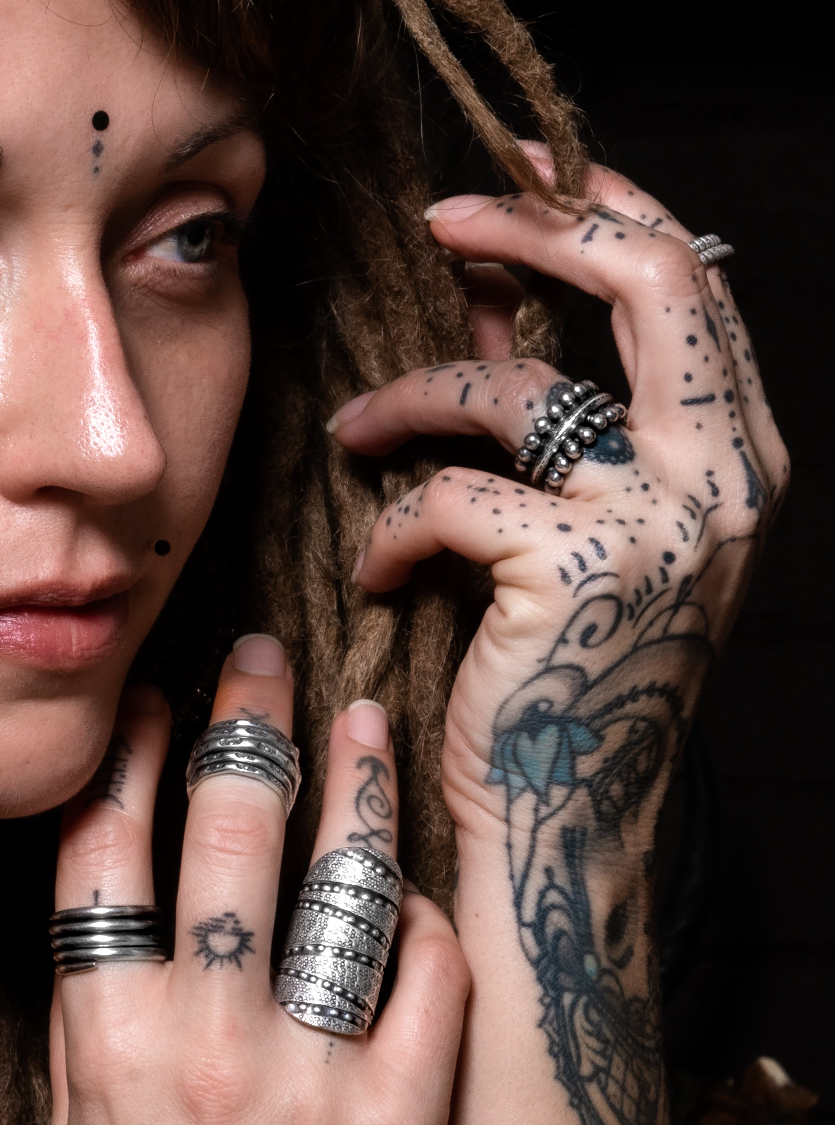model wearing Tribal Silver Ring With Carving Decorations