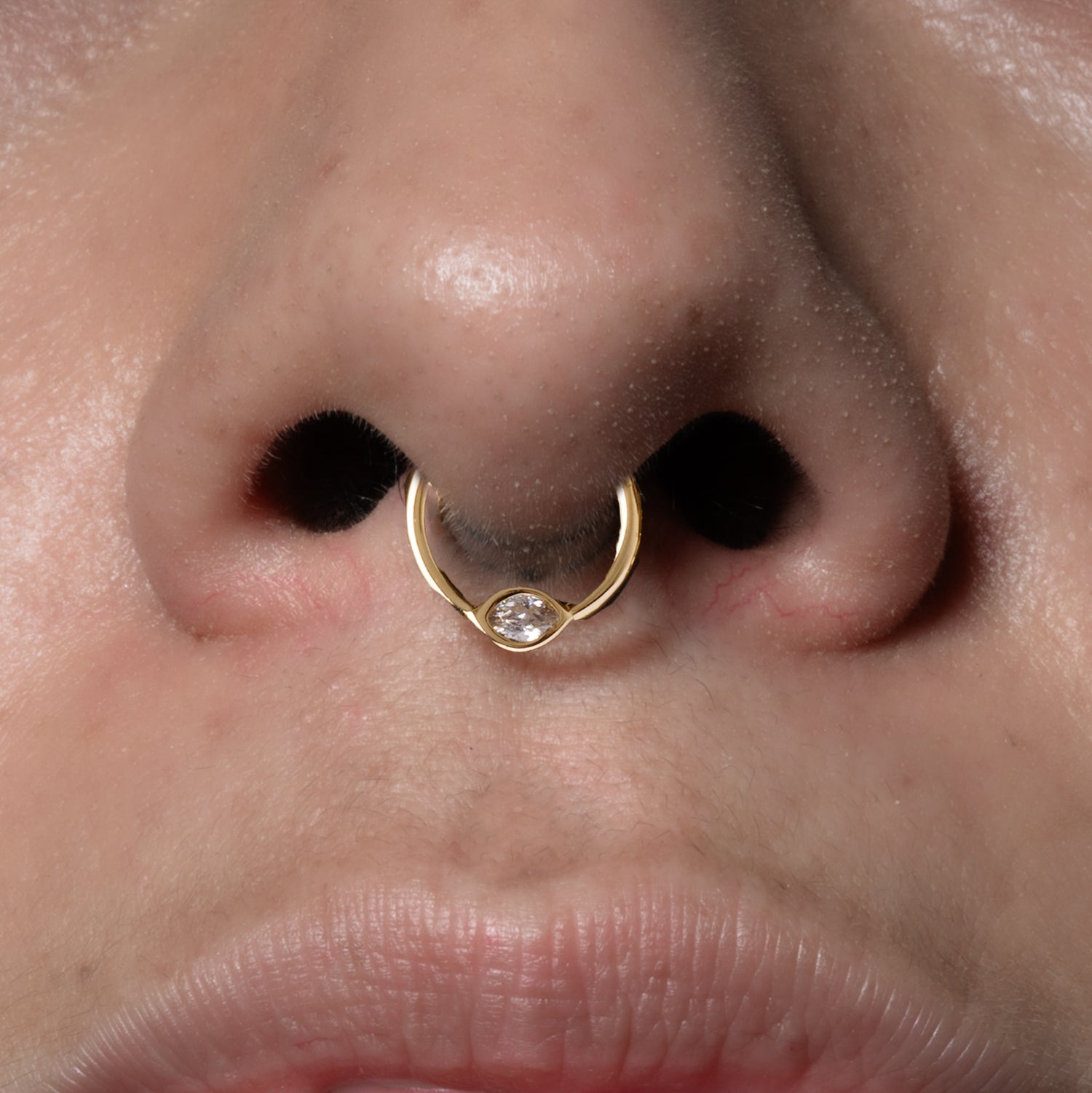 model wearing Zirconia Eye Clicker Ring on her setum