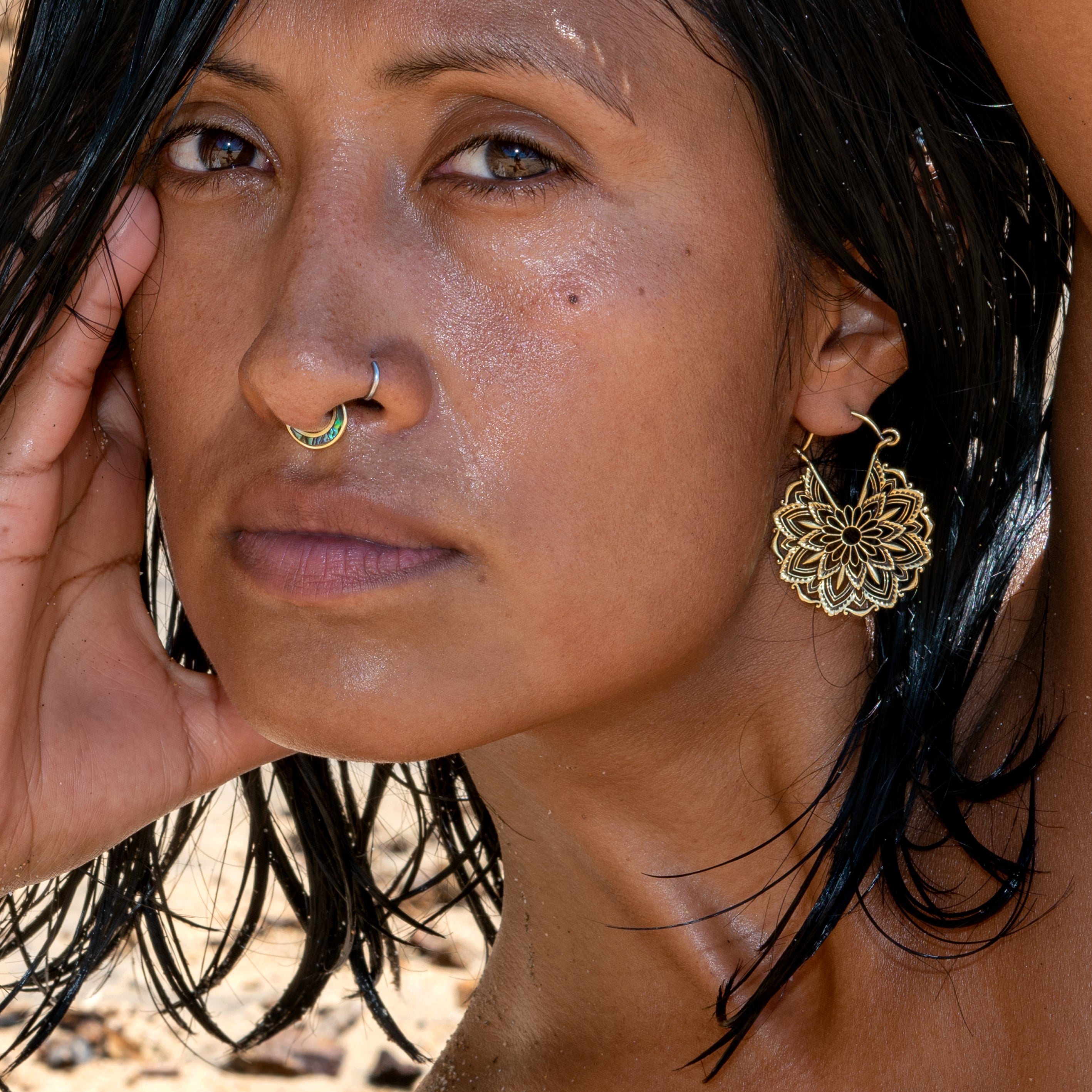 model wearing Mandala Lotus Flower Earrings