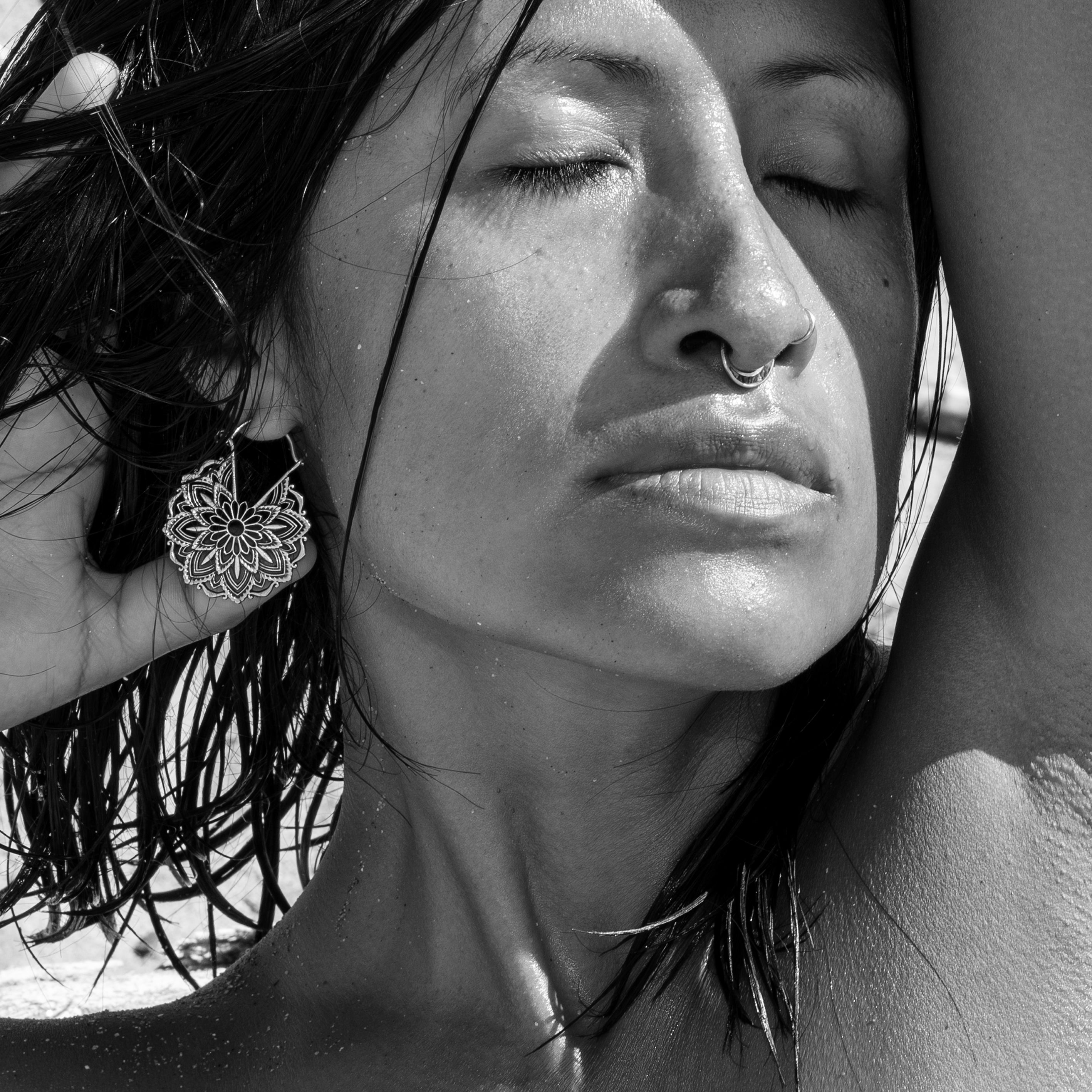 model wearing Mandala Lotus Earrings