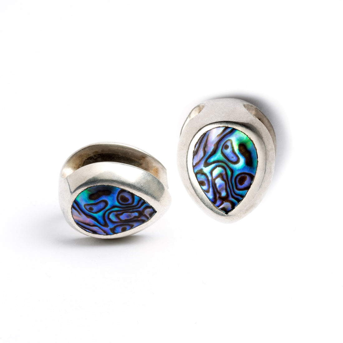 pair of silver teardrop ear saddles with abalone front and side view