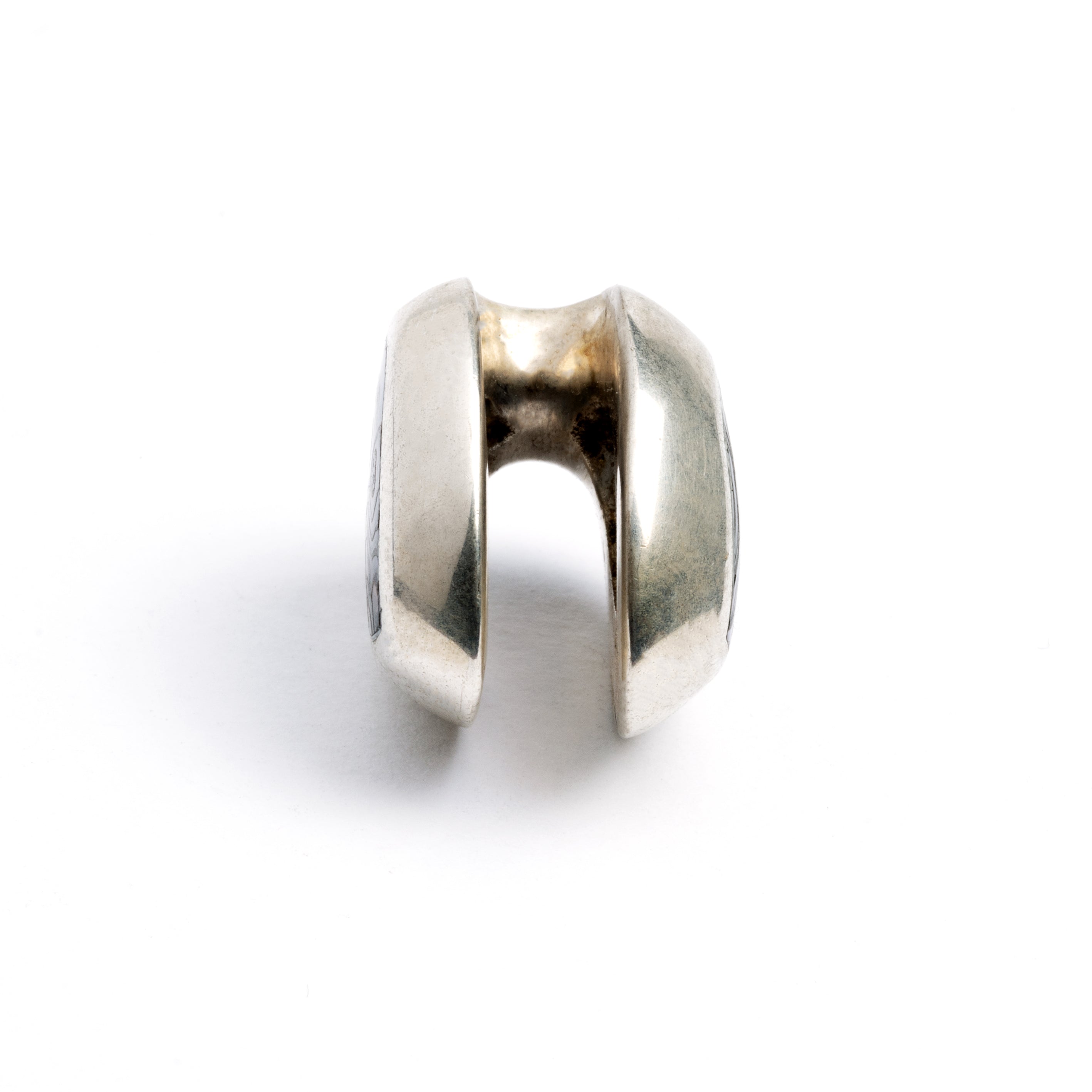 single silver teardrop ear saddle with abalone side view 